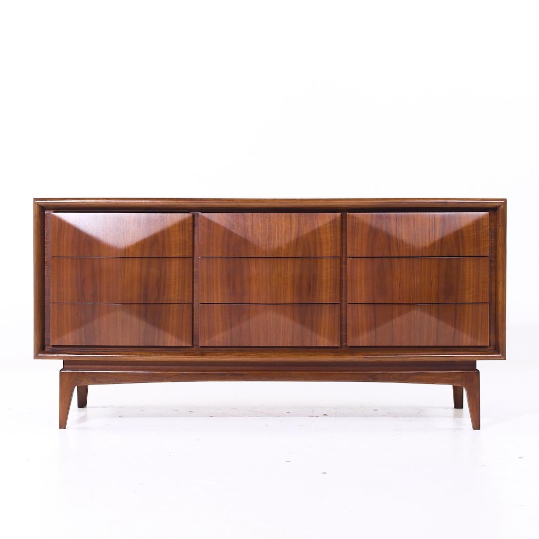 United Diamond Mid Century Walnut Lowboy Dresser

This lowboy measures: 62 wide x 19 deep x 30.5 inches high

All pieces of furniture can be had in what we call restored vintage condition. That means the piece is restored upon purchase so it’s free