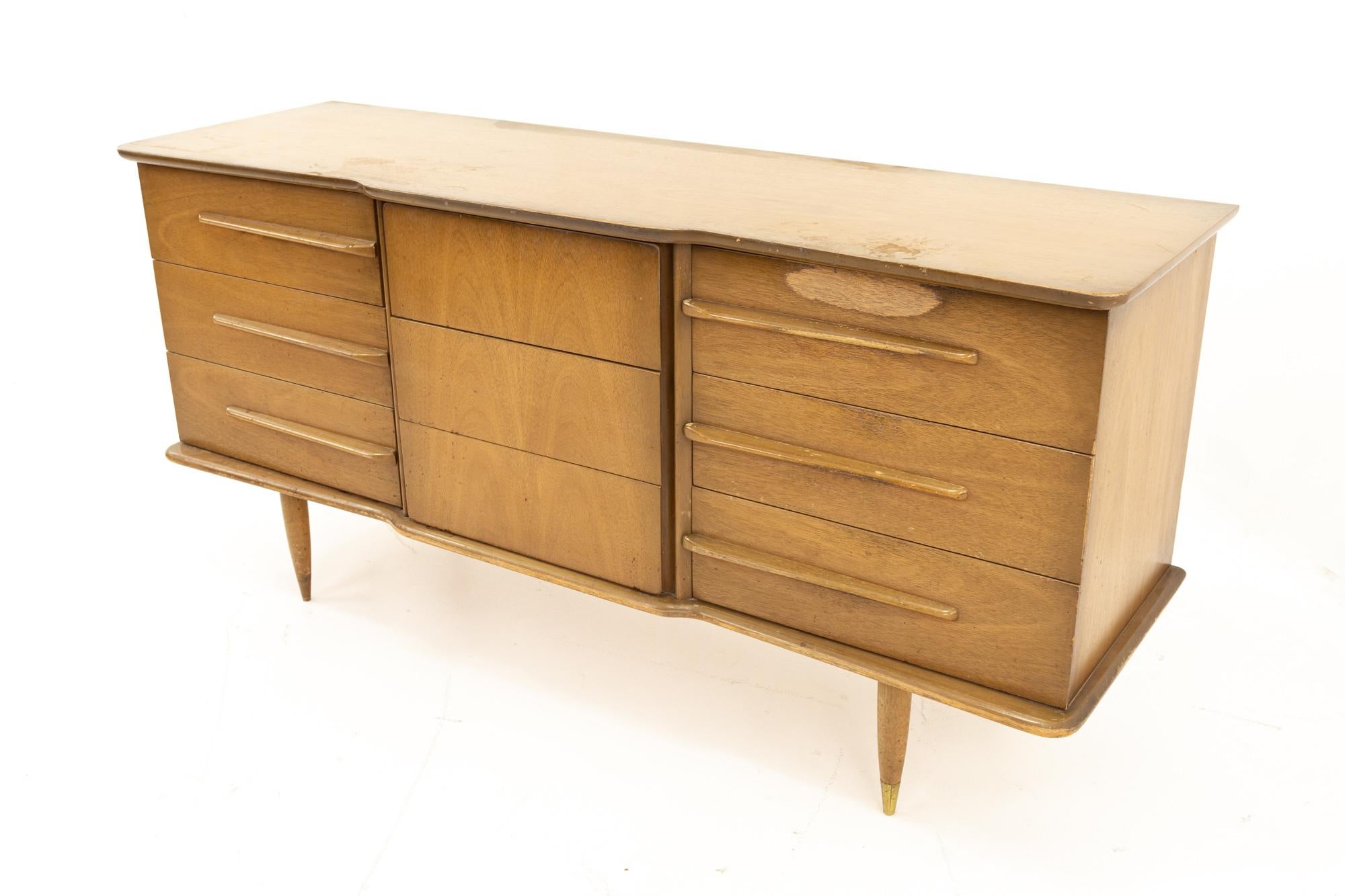 United furniture midcentury walnut 9 drawer lowboy dresser
This dresser is 62 wide x 19 deep x 30 inches high

All pieces of furniture can be had in what we call restored vintage condition. That means the piece is restored upon purchase so it’s