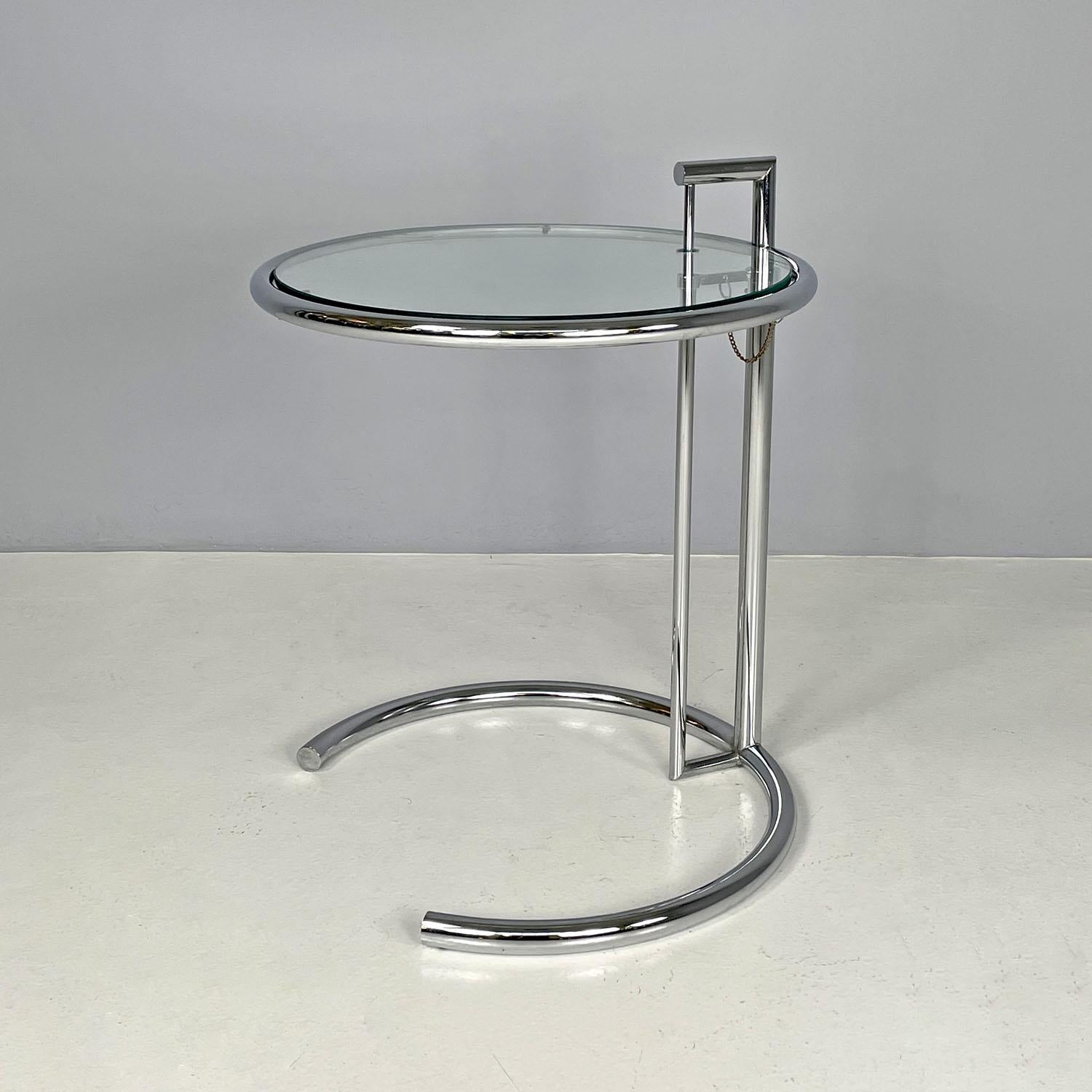 United Kingdom modern chromed metal glass coffee table E 1027 Eileen Gray, 1990s
Adjustable coffee table mod. E 1027, with round base structure in shiny chromed tubular steel, with glass top. The top is adjustable in height, thanks to a metal stop