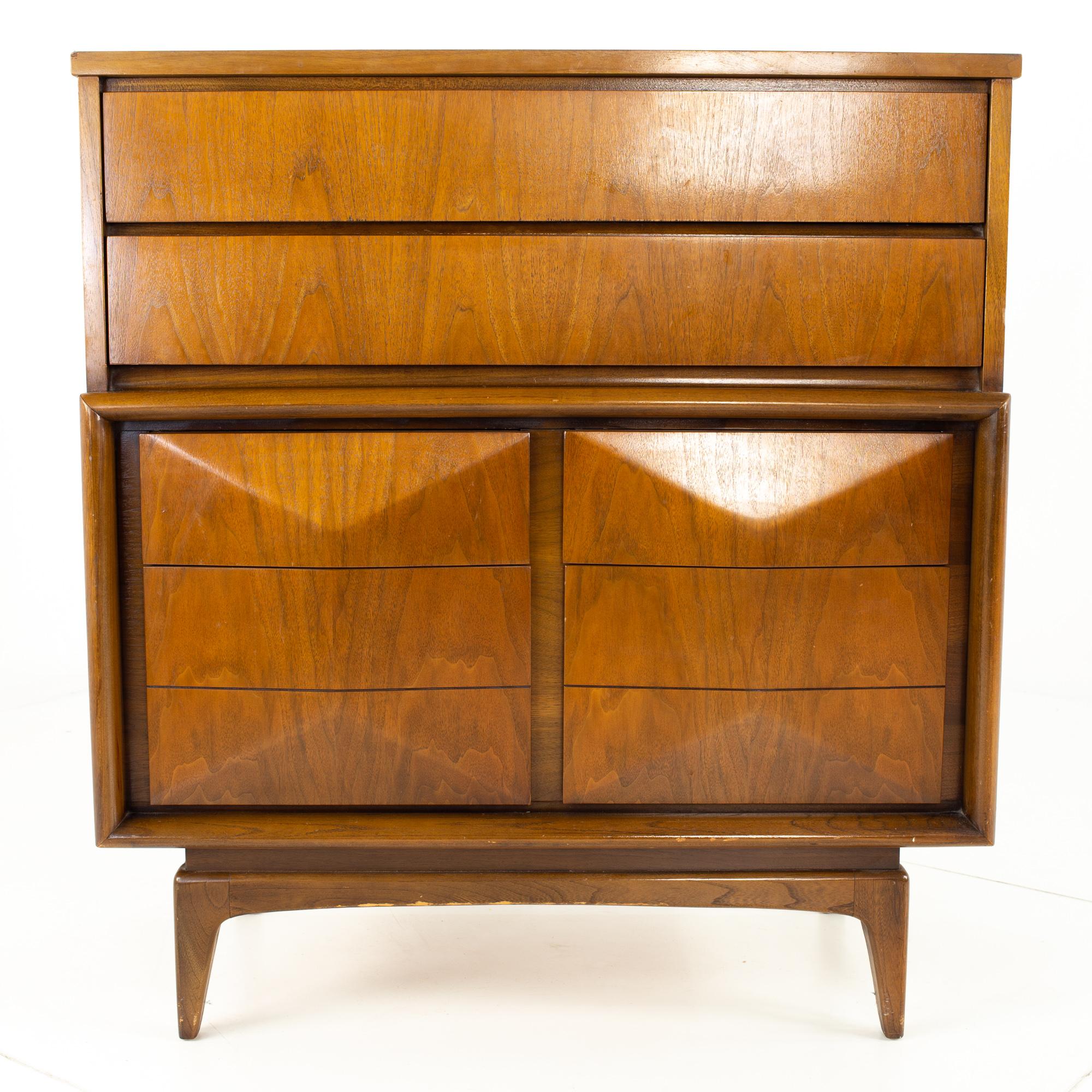 United mid century diamond 8 drawer walnut highboy dresser.

This dresser measures: 40 wide x 17.5 deep x 43.75 inches high

All pieces of furniture can be had in what we call restored vintage condition. That means the piece is restored upon