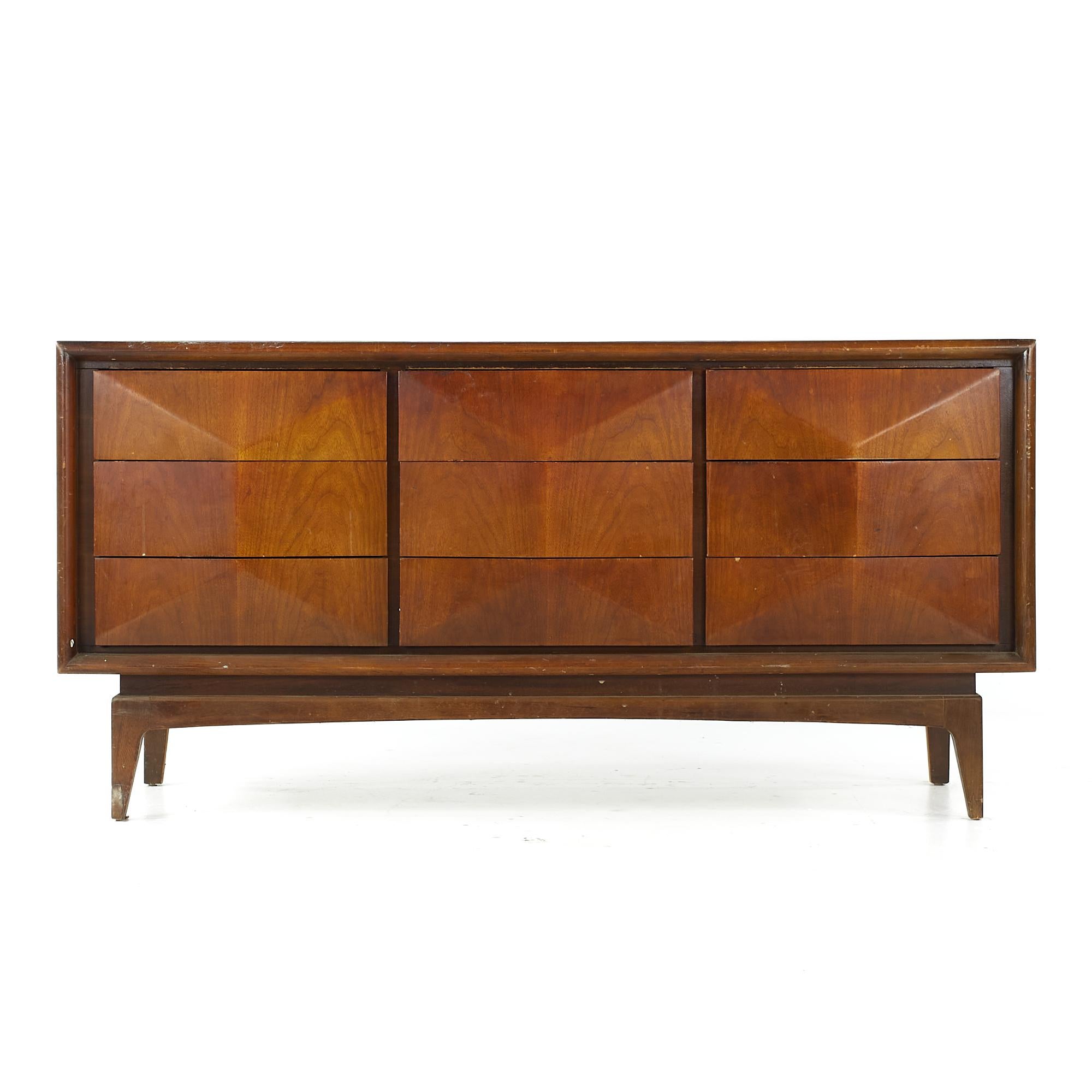 United midcentury diamond walnut lowboy 9 drawer dresser.

This lowboy measures: 62 wide x 19 deep x 30.75 inches high.

All pieces of furniture can be had in what we call restored vintage condition. That means the piece is restored upon