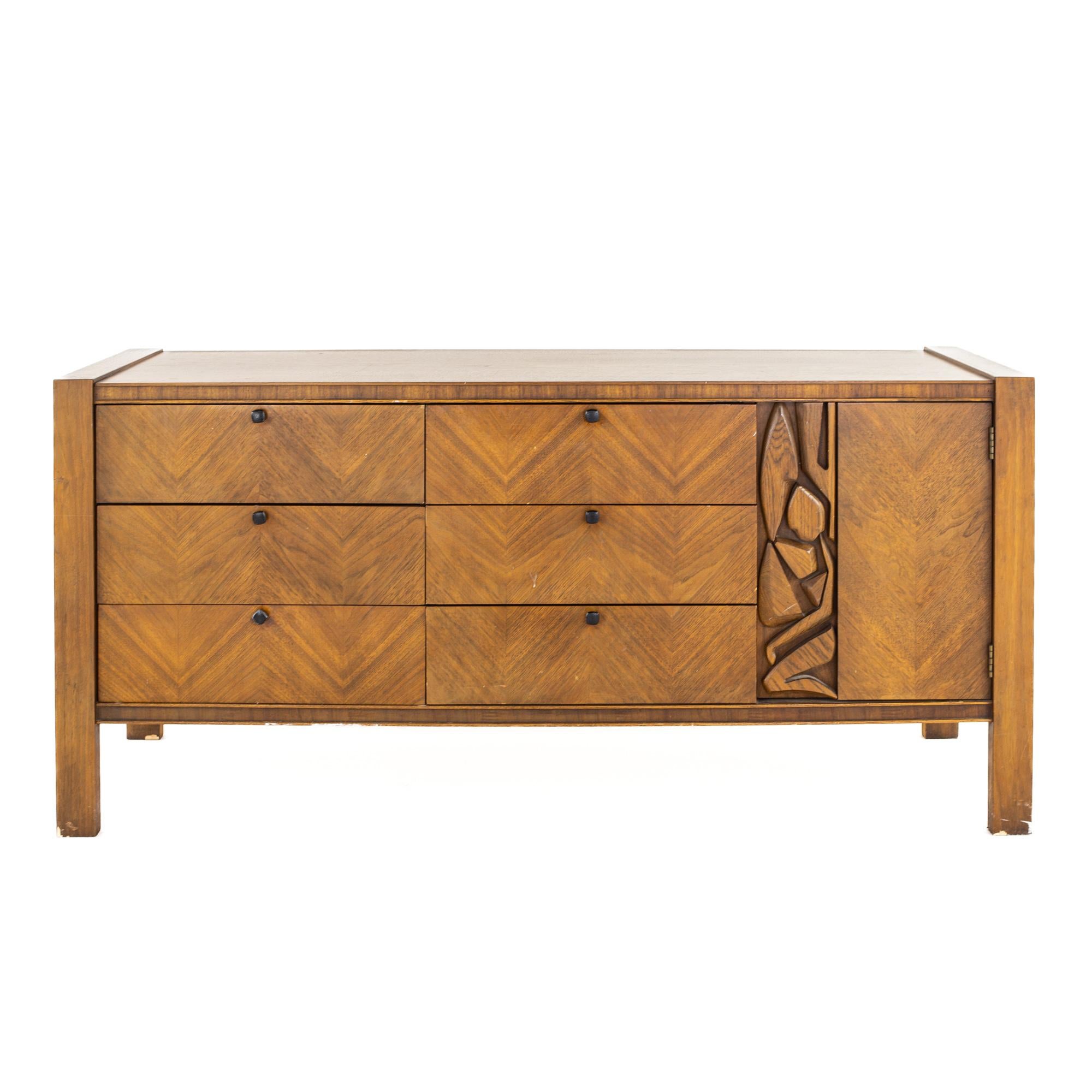 United Mid Century Tiki Walnut Lowboy Dresser

The dresser measures: 69 wide x 20 deep x 33 inches high

All pieces of furniture can be had in what we call restored vintage condition. That means the piece is restored upon purchase so it’s free