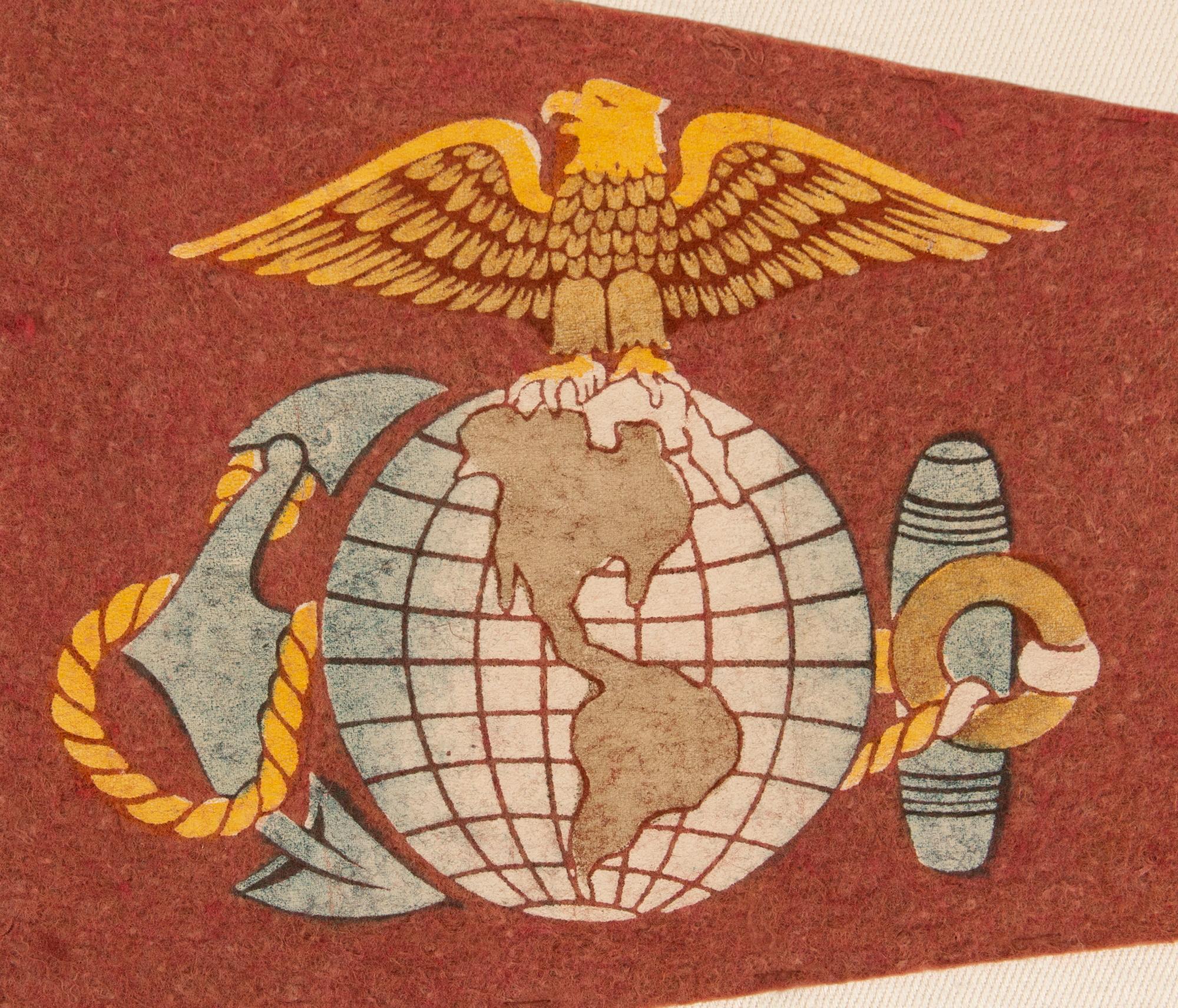 UNITED STATES MARINE CORPS PENNANT FROM PARRIS ISLAND, circa WWI (U.S. INVOLVEMENT 1917-18) -1930’s

Faded, red, felt, United States Marine Corps pennant with a variant of the central device of its official seal printed in blue, yellow, gold, tan,