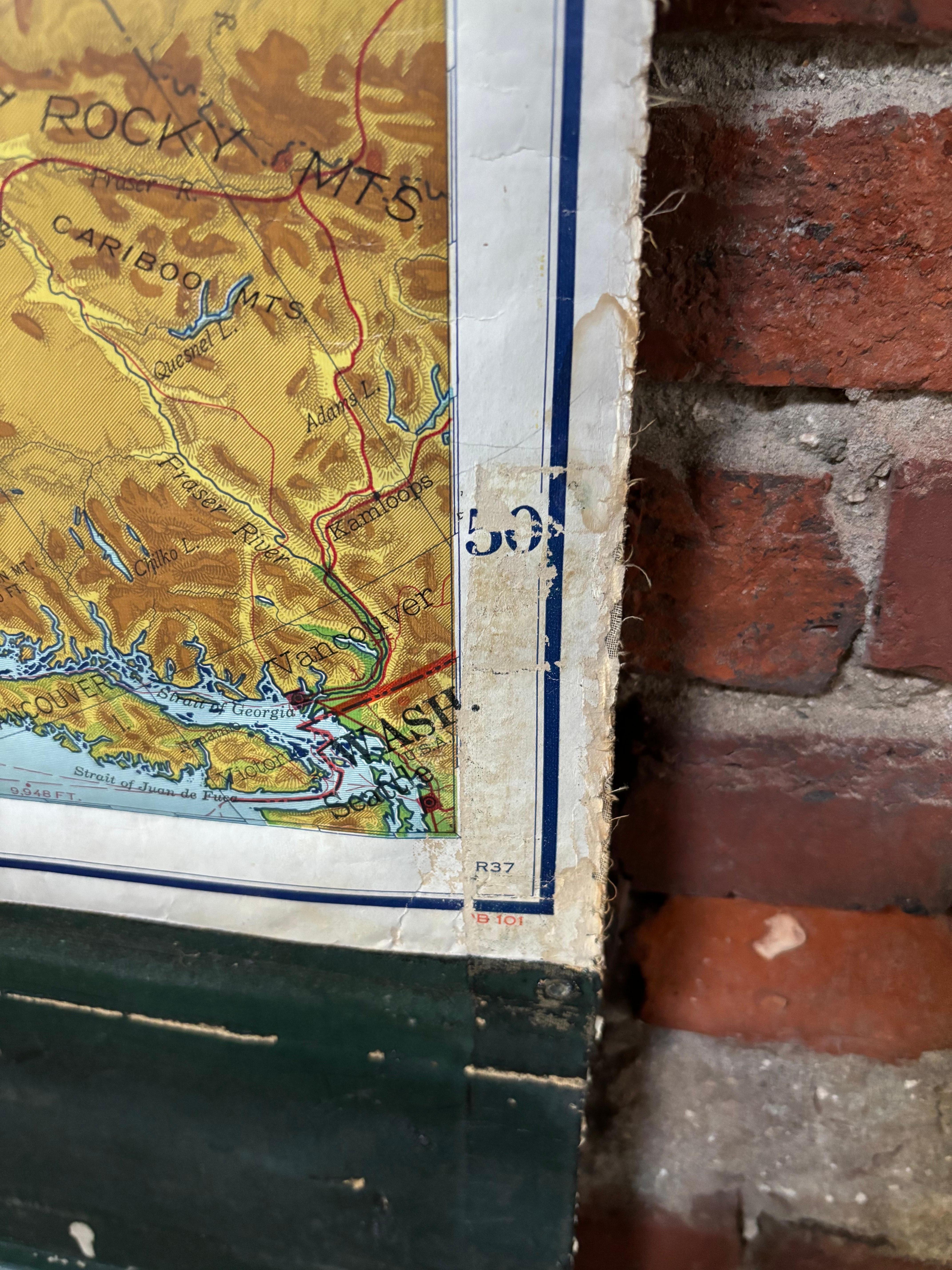 United States Roll Up Map.  In nice original condition.  Roll-up Function even works!  Great Colors!  Some losses to edges, canvas backing shows edge wear.