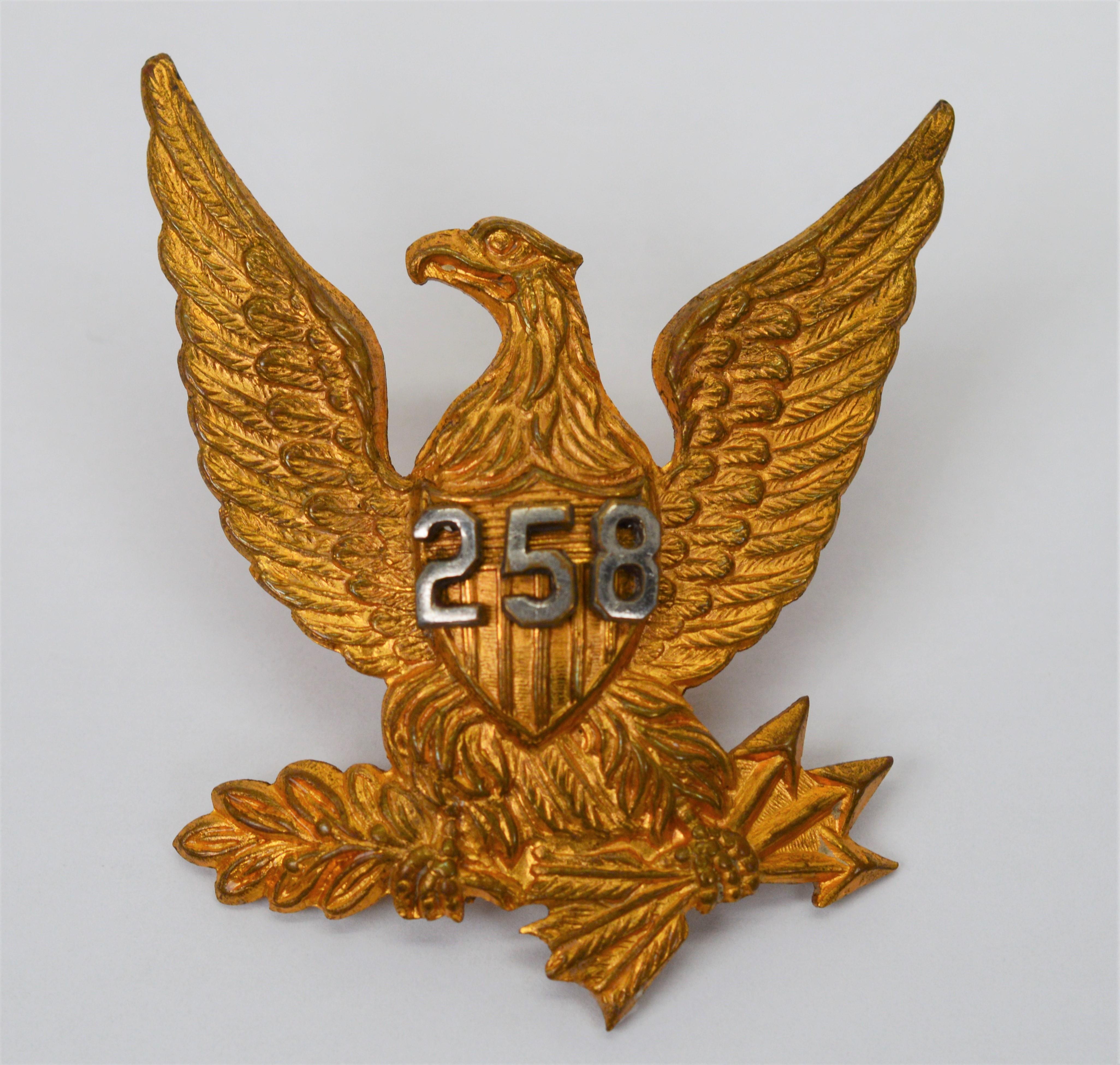 Circa 1872, this antique brass U.S. Army Dress Cap Badge is a rare and unusual find. The battalion marking, 258, is proudly displayed across the eagle's chest. The cap badge measures 1-7/8 wing to wing and the same head to feathers. The back of the