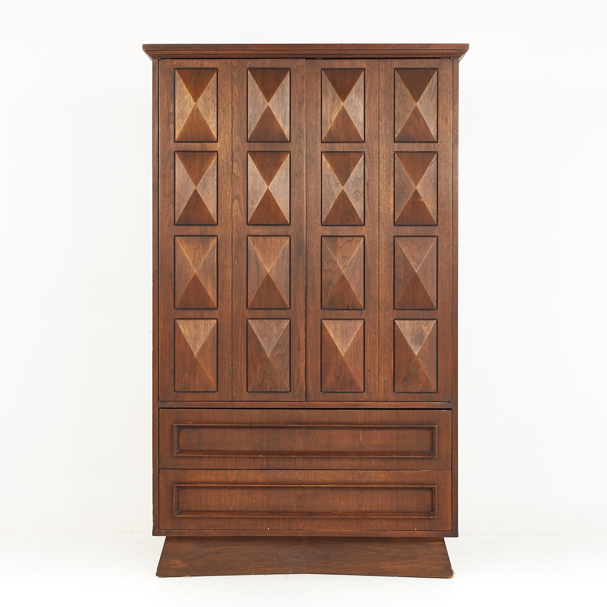 United style Brutalist mid century walnut highboy armoire dresser

The dresser measures: 39.5 wide x 20 deep x 65 inches high

All pieces of furniture can be had in what we call restored vintage condition. That means the piece is restored upon
