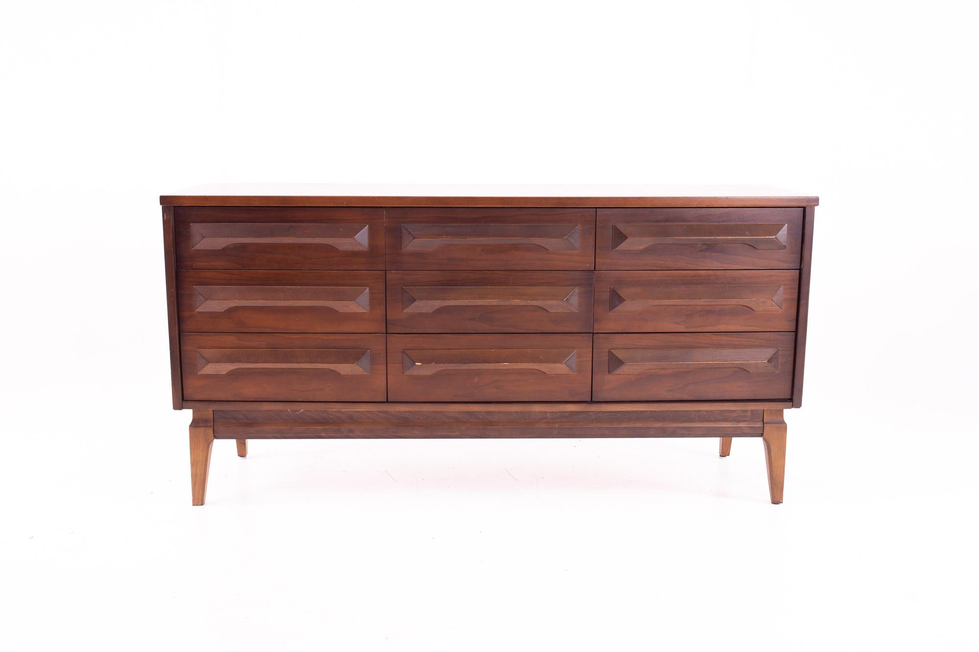 Midcentury walnut 9-drawer lowboy dresser
Dresser measures: 60.25 wide x 17.5 deep x 30.25 high

All pieces of furniture can be had in what we call restored vintage condition. That means the piece is restored upon purchase so it’s free of