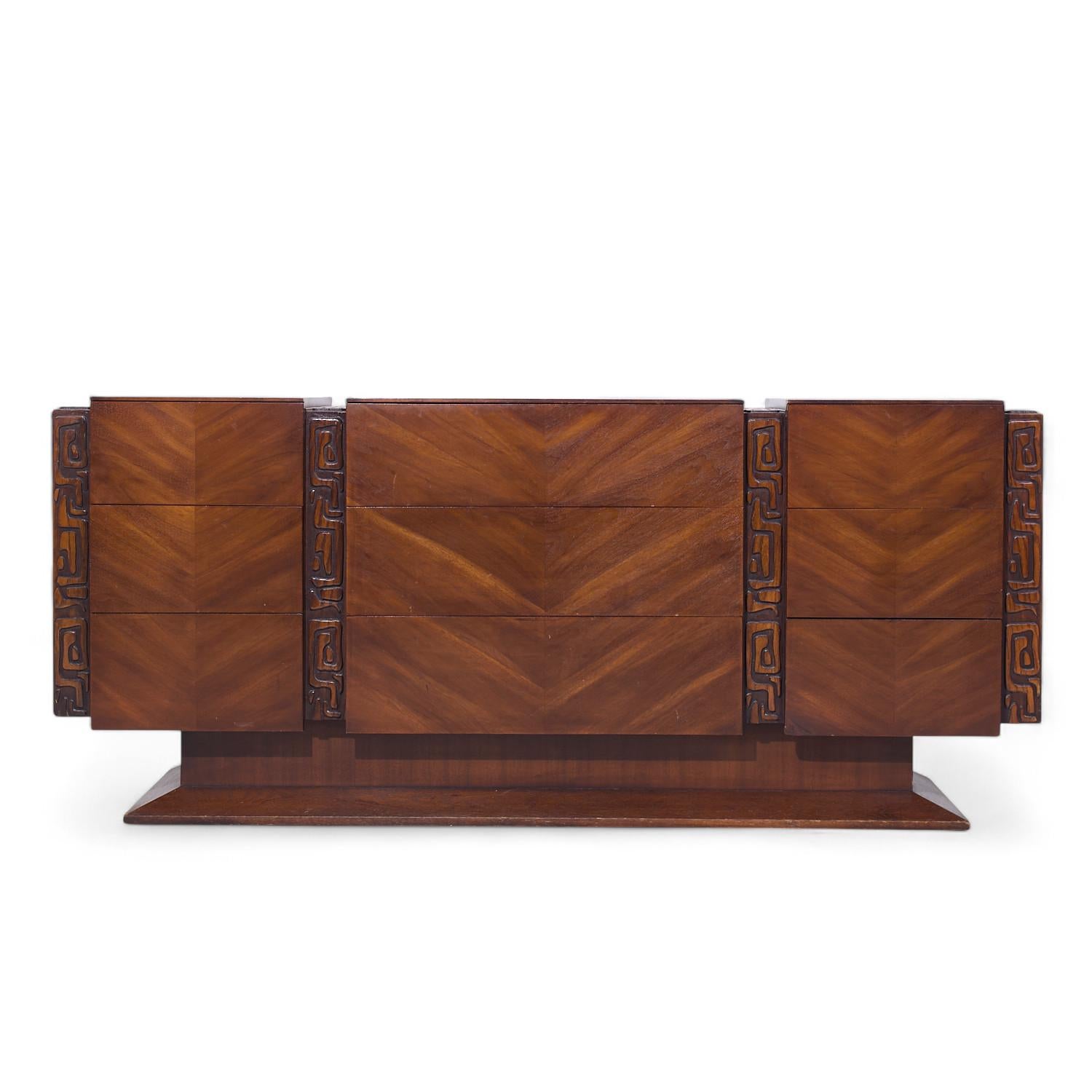 United Tiki Brutalist Mid Century Walnut Lowboy Dresser

This lowboy measures: 74 wide x 19 deep x 32 inches high

All pieces of furniture can be had in what we call restored vintage condition. That means the piece is restored upon purchase so it’s