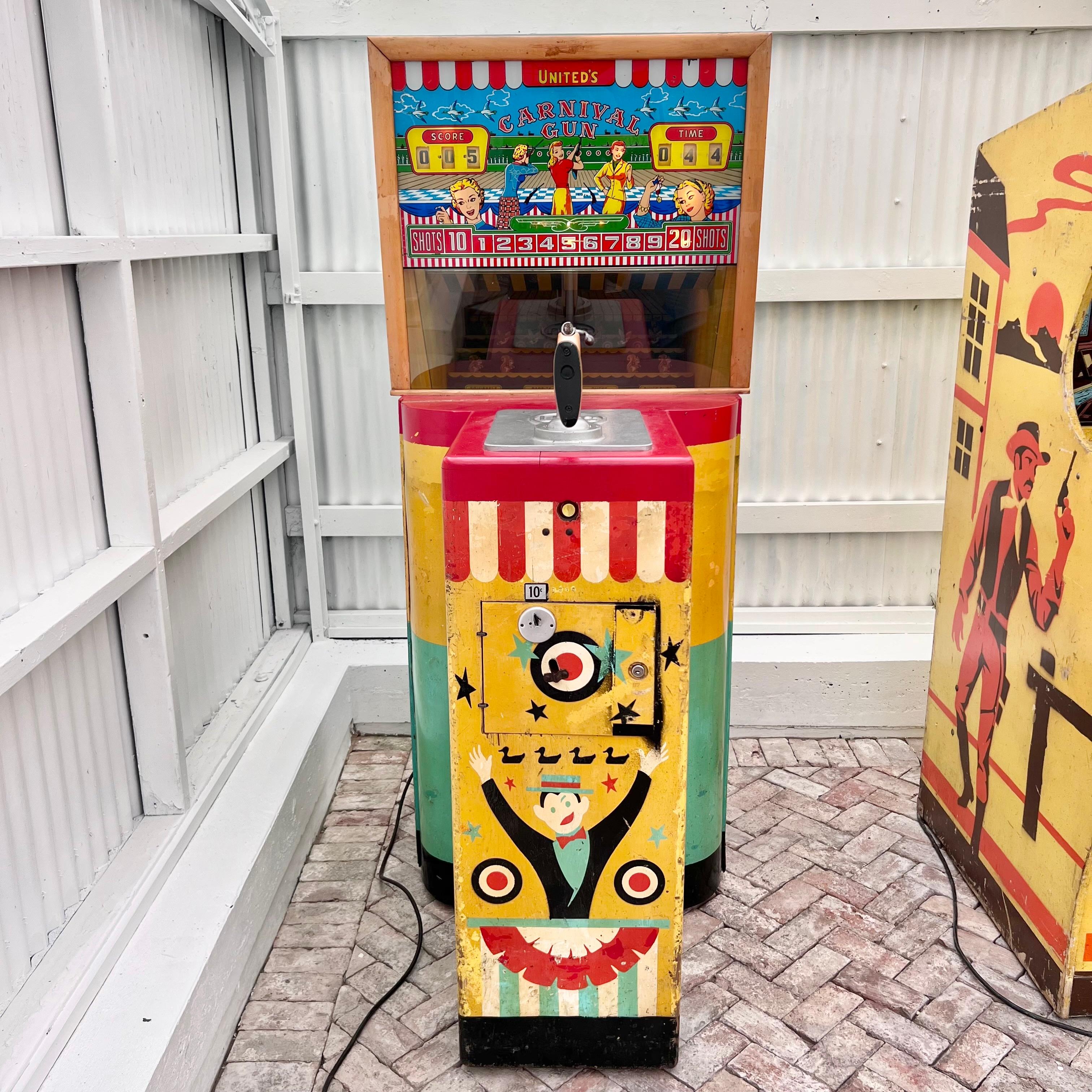 Vintage circa 1954 “Carnival Gun” arcade rifle game manufactured by United Mfg. Large Dale-style gun game. As the targets are on the move, use the gun to shoot targets until the 20 shots given run out. There are 4 different types of targets;