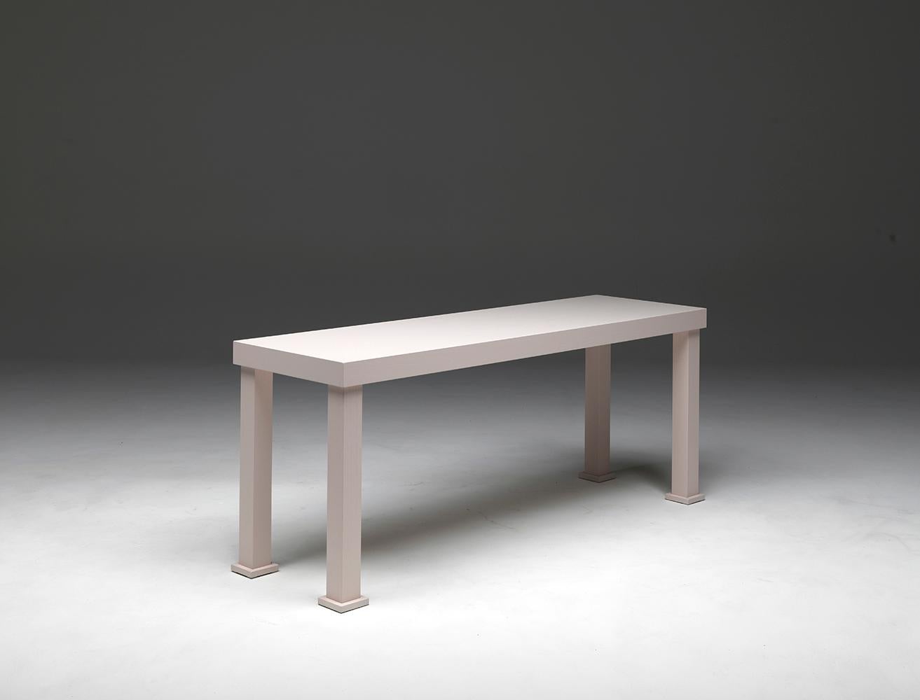 Universal-Console. Rectangular pink console in open-pore lacquered ash wood, with square legs. Designed by Aldo Cibic. A console with a strong yet not exaggerated personality, with warm and pleasant functionality, easy to combine with different