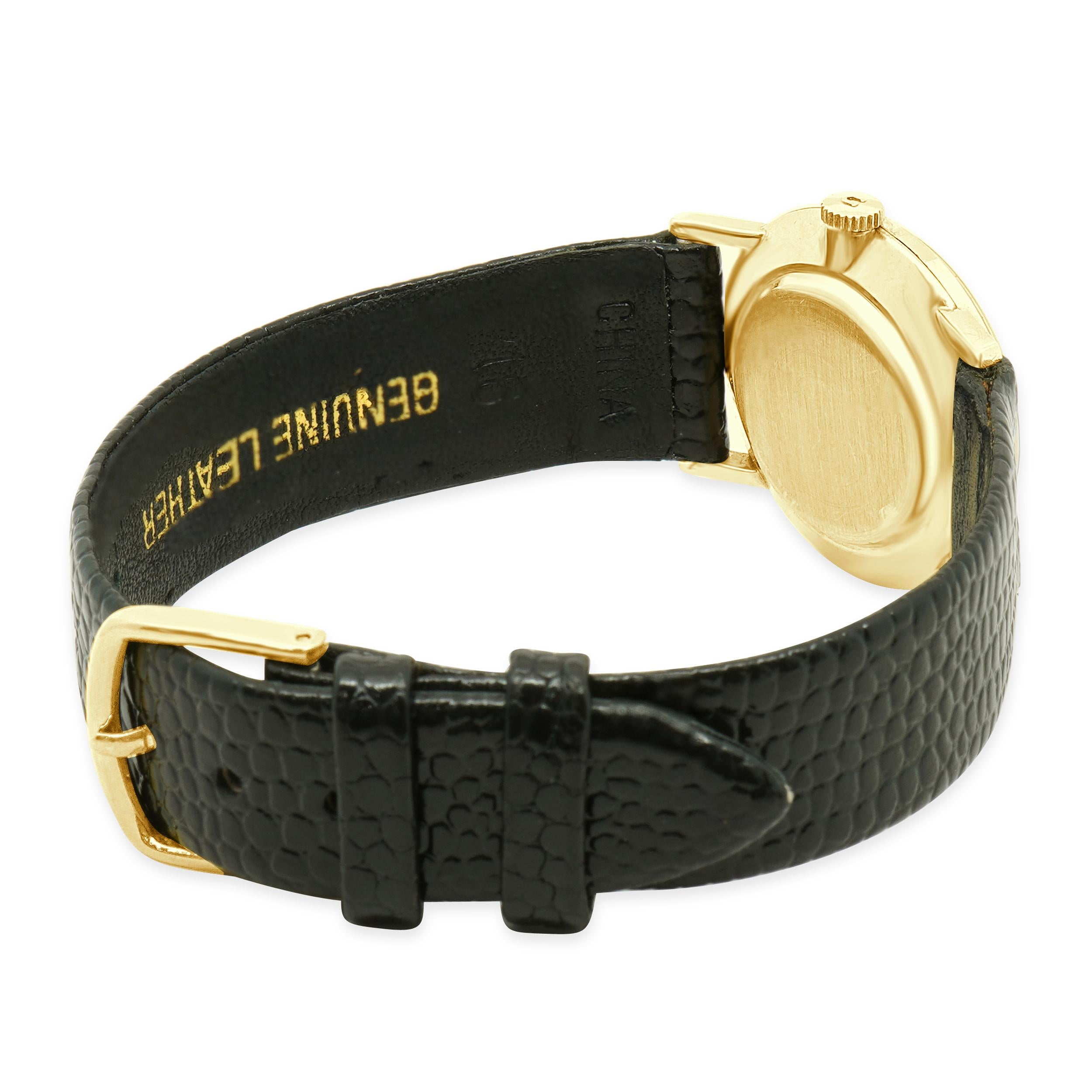 Movimiento: cuerda manual
Función: horas, minutos
Caja: Caja de 26 mm de oro amarillo de 14 quilates
Esfera: esfera de moneda
Pulsera: correa de piel negra
Nº de referencia: 4155
Número de serie  51XXX

Sin caja ni papeles
Garantizado como auténtico