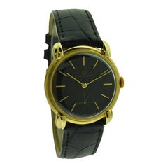 Universal Geneve 18 Karat Yellow Gold Dress Model with Rare Original Black Dial