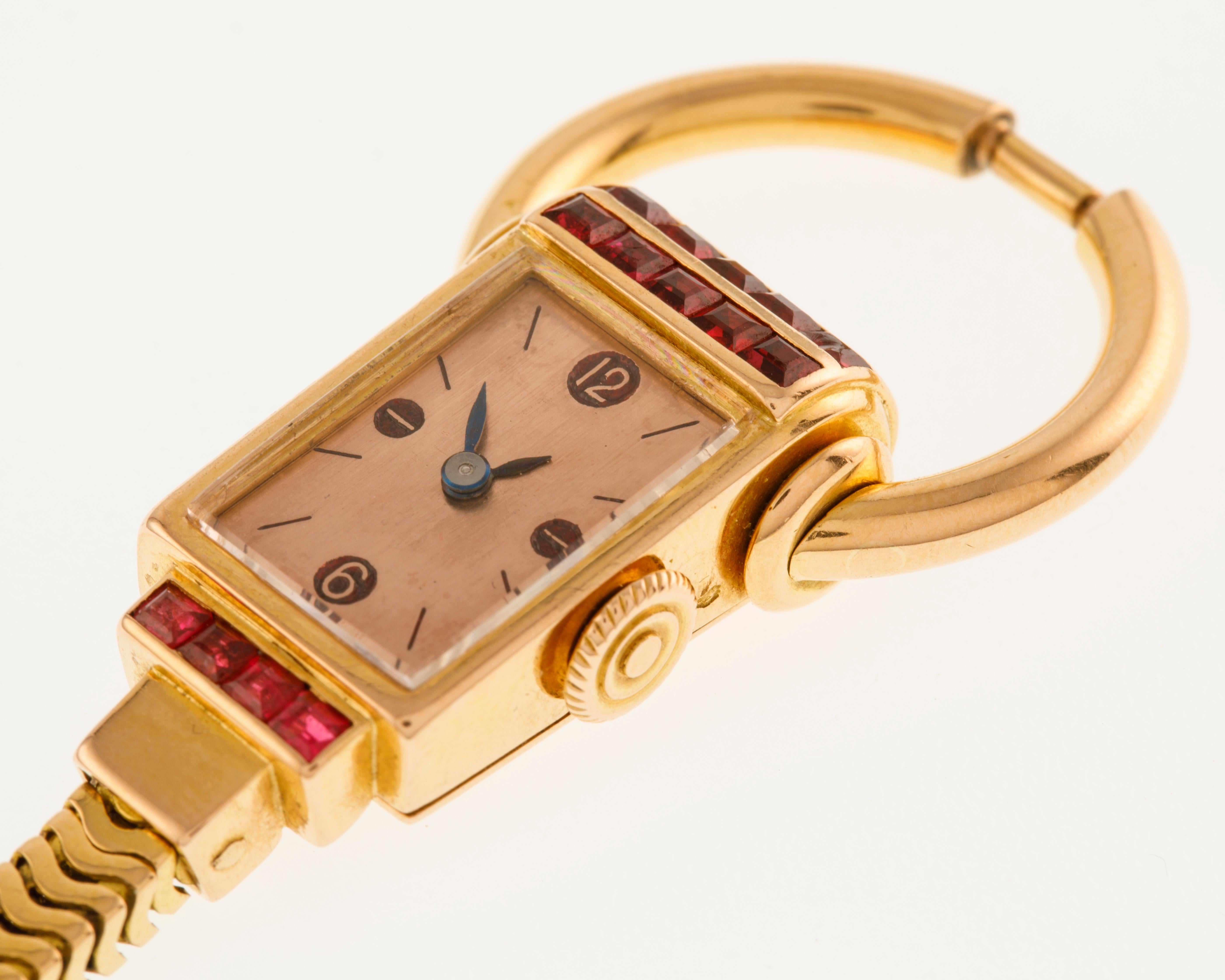 Round Cut Universal Genève Lady Jewelry Bracelet Watch 18 Carat Yellow Gold and Rubies For Sale