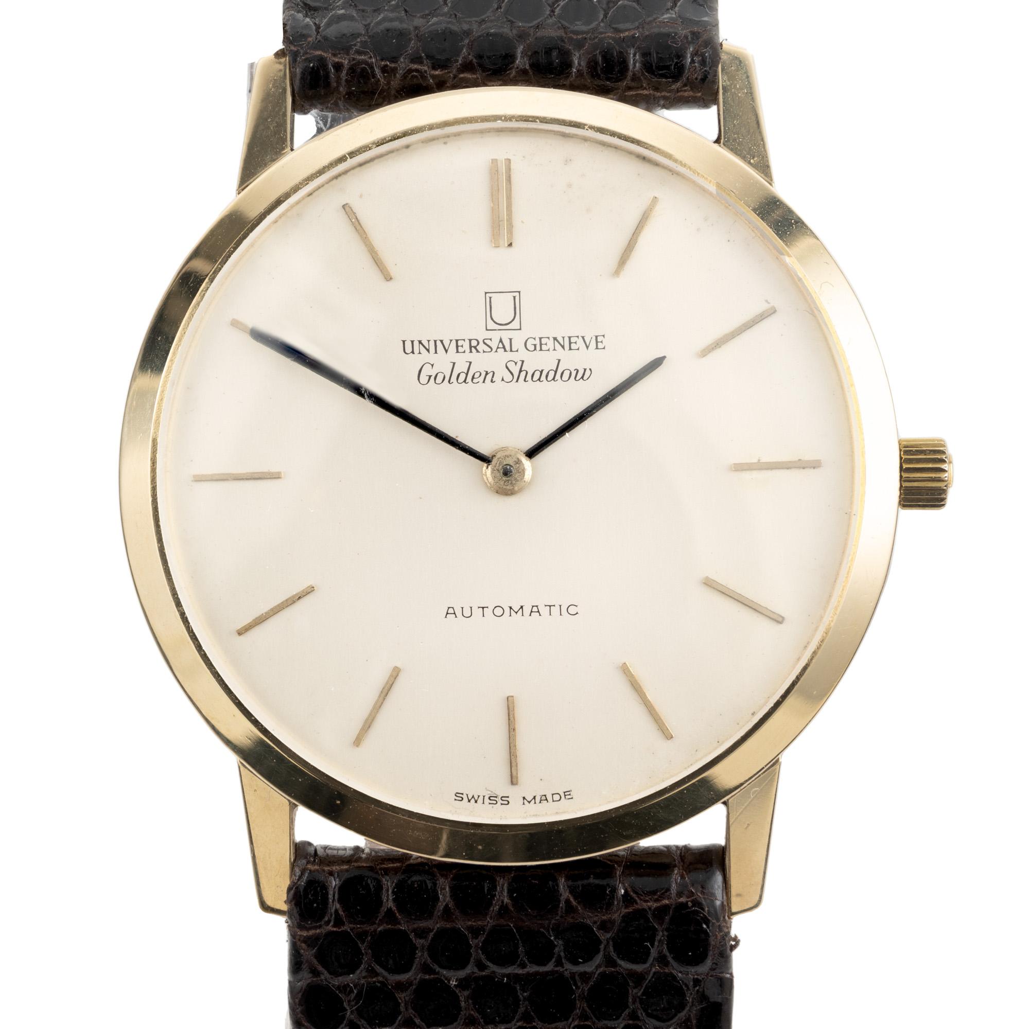 1960's Universal Geneve Micro Rotor Calatrava Golden Shadow Men's Wristwatch, a timepiece that embodies both elegance and innovation. This wristwatch showcases a stunning golden shadow hue, adding a touch of sophistication to any ensemble. 18k