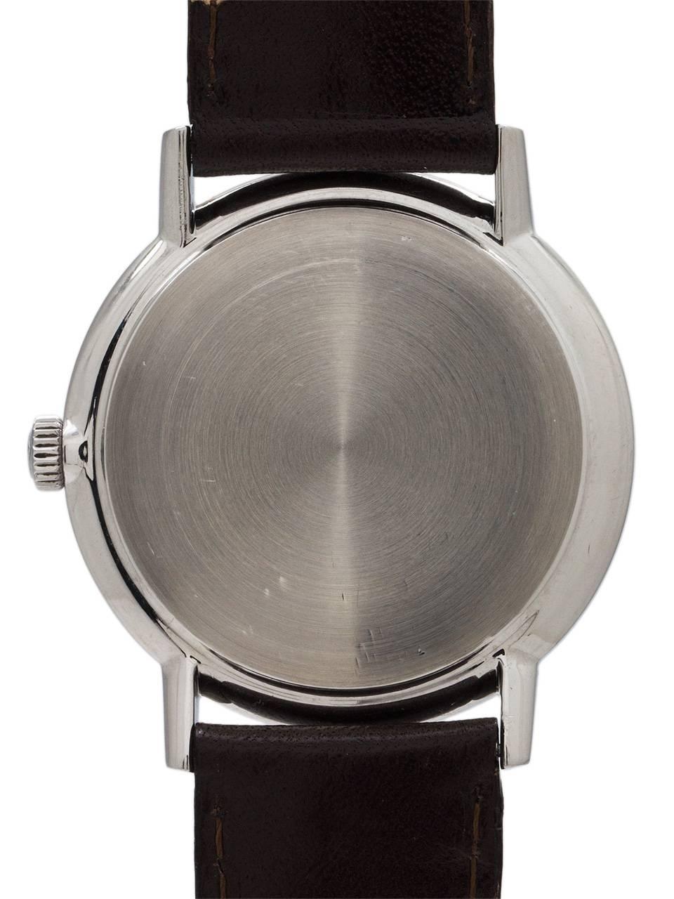 Universal stainless steel Geneve Polerouter Compact automatic wristwatch In Excellent Condition In West Hollywood, CA