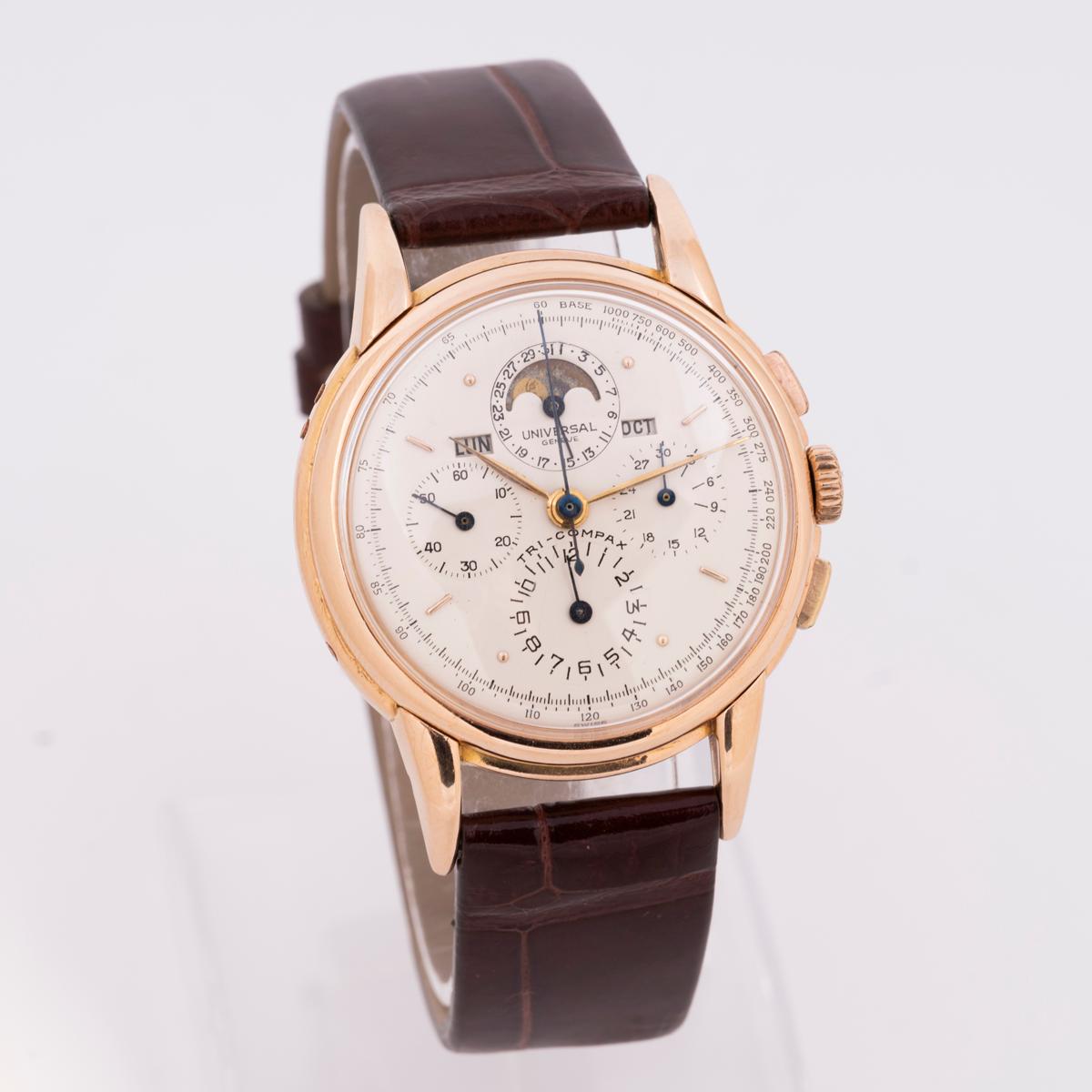 A 36mm rose gold vintage Universal Geneve Tri-Compax Calendar. Featuring a silver dial with displays of the date, day, month and moon phase. The dial also features a small seconds sub-dial, a 30 minute counter as well as a 12 hour recorder, all with