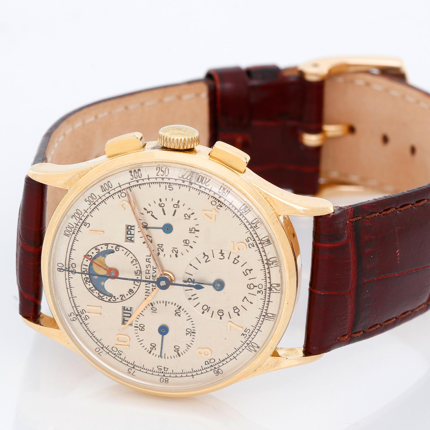 Universal Geneve 18K Yellow Gold  Chronograph Watch - Manual winding. 18K Yellow gold  ( 35 mm ). Silvered dial with raised gold Arabic numerals; Black registers, telemeter, tachometer, triple date and moon phases, blue hands. Burgundy strap.