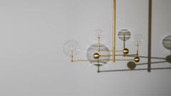 Universe Chandelier: Brass & Glass Contemporary Design by Schwung