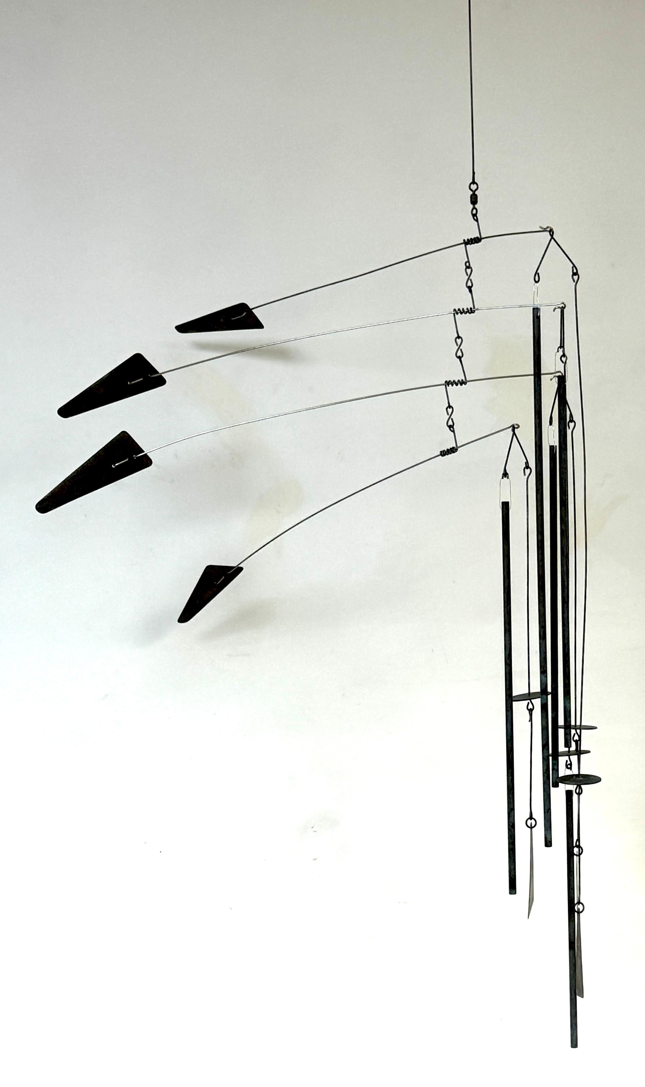 Unknown American Artisan Modern Steel Kinetic Mobile, Circa 1970s 

This striking kinetic mobile, made by an unknown American artisan in the 1970s, embodies the spirit of modern abstract and figurative design. Made from natural patinated steel, this