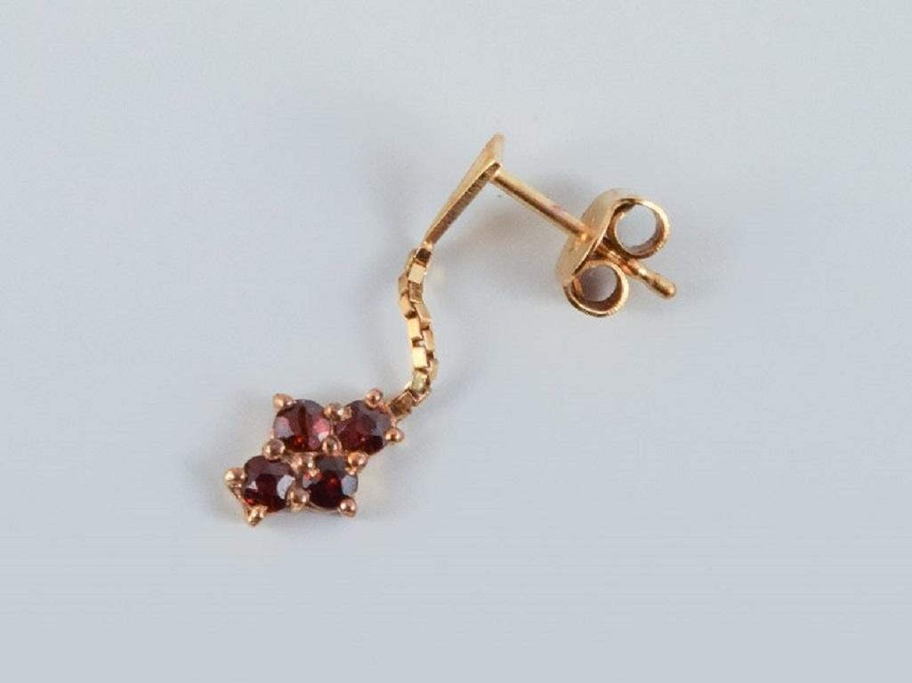 Women's Unknown goldsmith, a pair of earrings adorned with semi-precious stones. For Sale