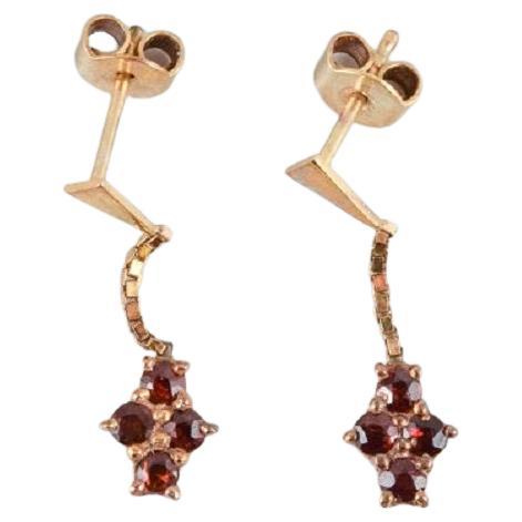Unknown goldsmith, a pair of earrings adorned with semi-precious stones. For Sale