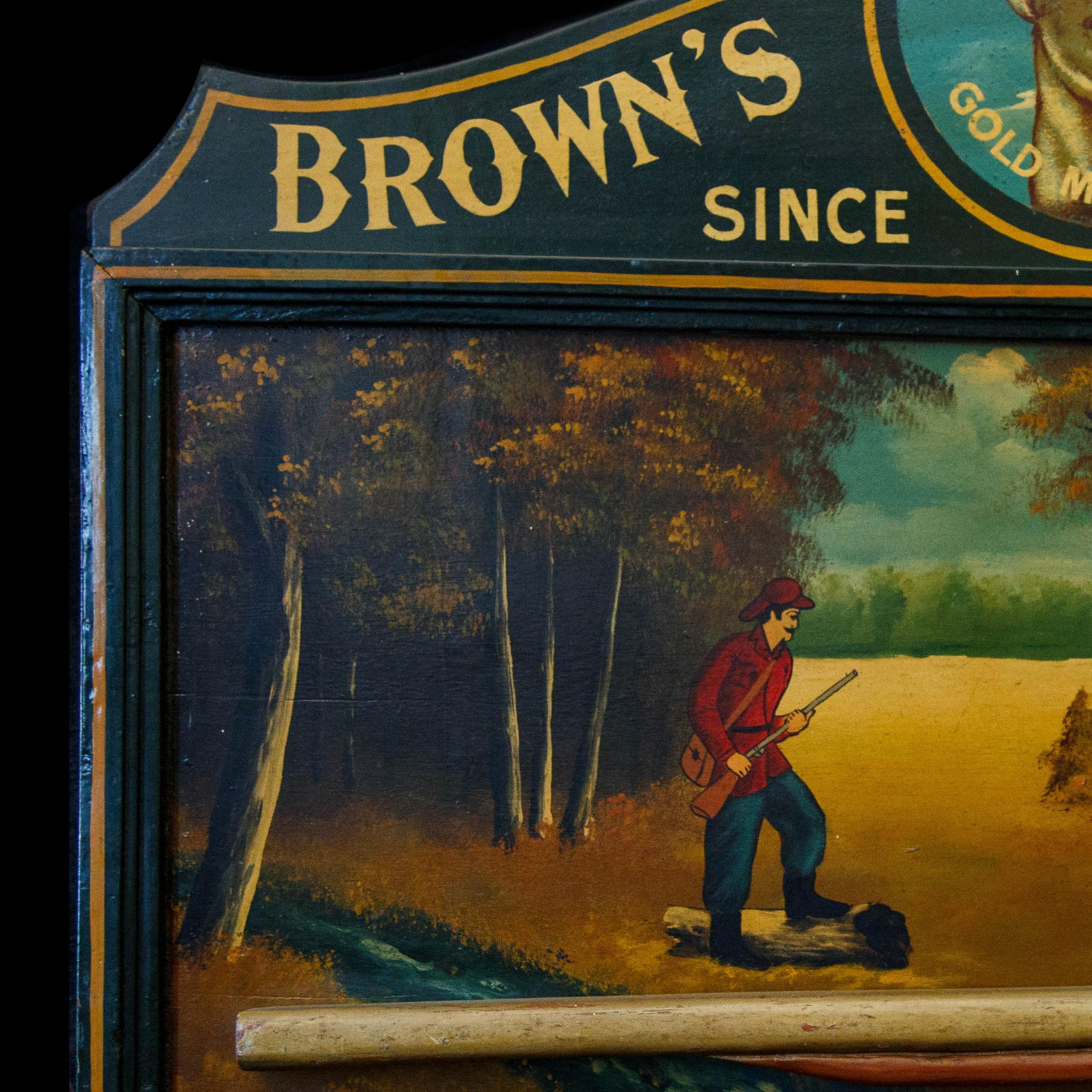 A Brown’s Finest Sporting sign
Painted wood, with a modelled gun
28 ½  x 38 in. (72.4 x 96.5 cm.)

Minor scuffs and surface dirt.
