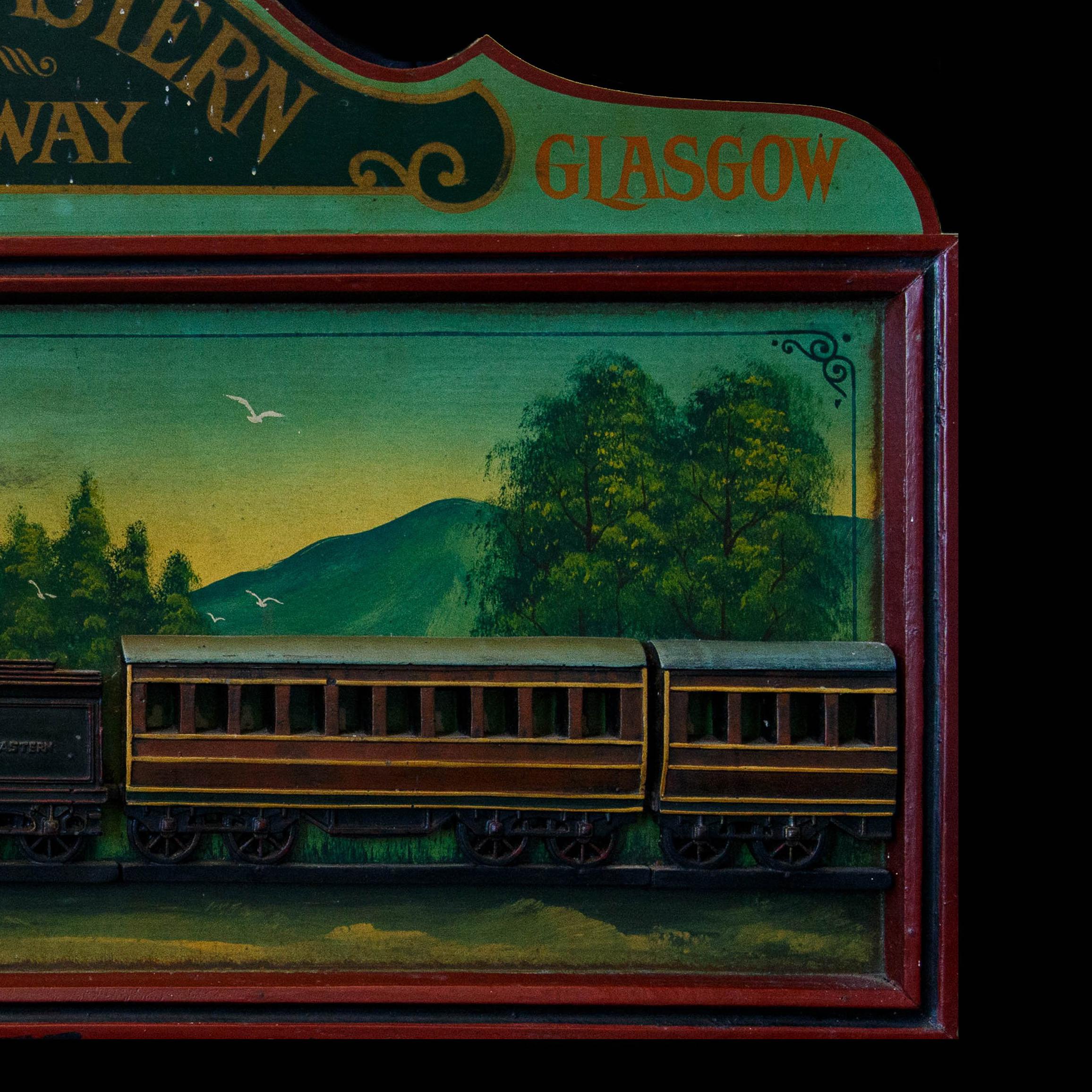 Panneau de signalisation du chemin de fer North-Eastern de Londres à Glasgow, 20e siècle
Bois peint,  avec le train modélisé
21 ⅜ x 36 ¼ po. (54,3 x 92,1 cm.)