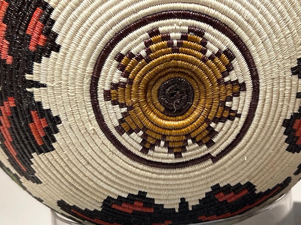Butterfly Basket, coil method, Panama, Darien Rainforest, Wounaan Tribe, white

The baskets are made by the Wounaan and Embera Indians from the Darien Rainforest in Panama.  The Wounaan believe they emerged from the palm tree. They weave baskets