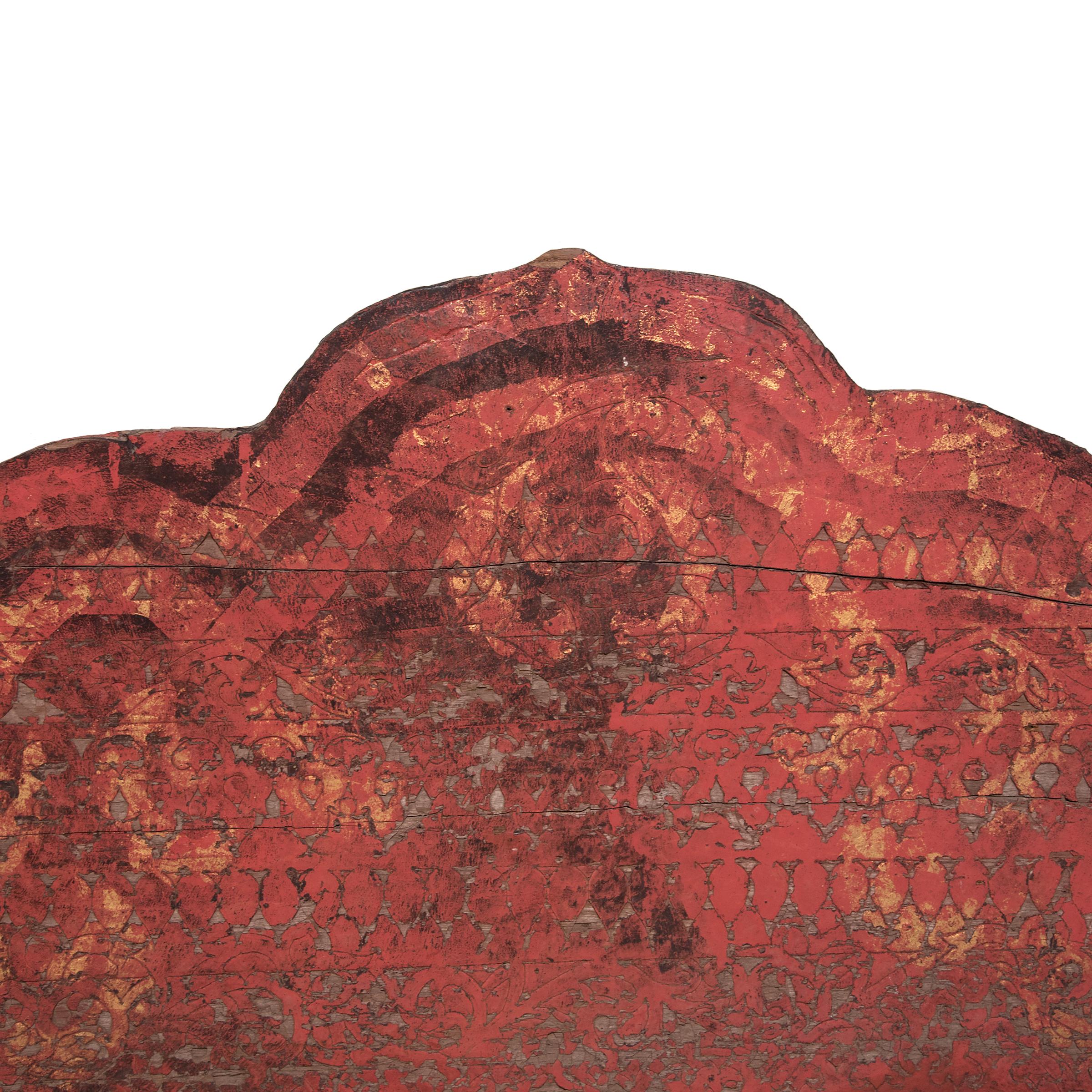 This antique architectural fragment beautifully exemplifies the textured wear and soft patina that only time can achieve. Given its cusped arch shape and flame-like corners, the panel may have originated as an overhead element to a door, archway, or