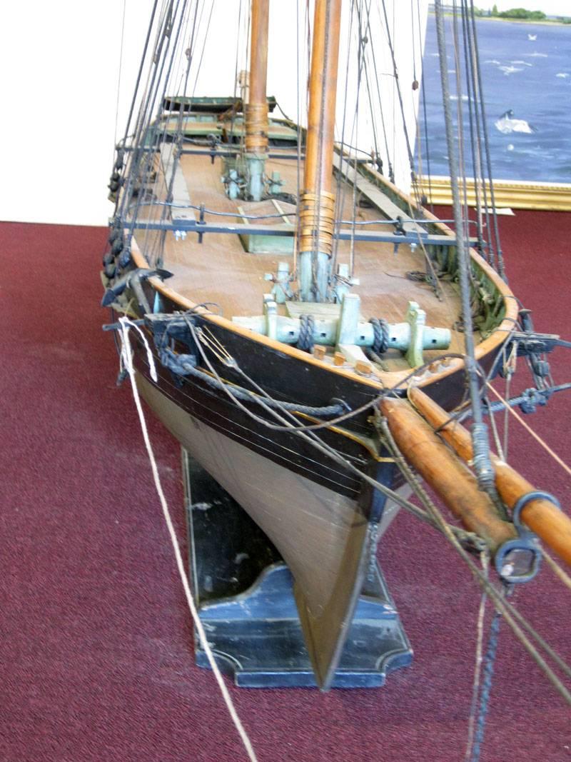 A superb plank-on-frame wood ship model from the early 20th century. The schooner 