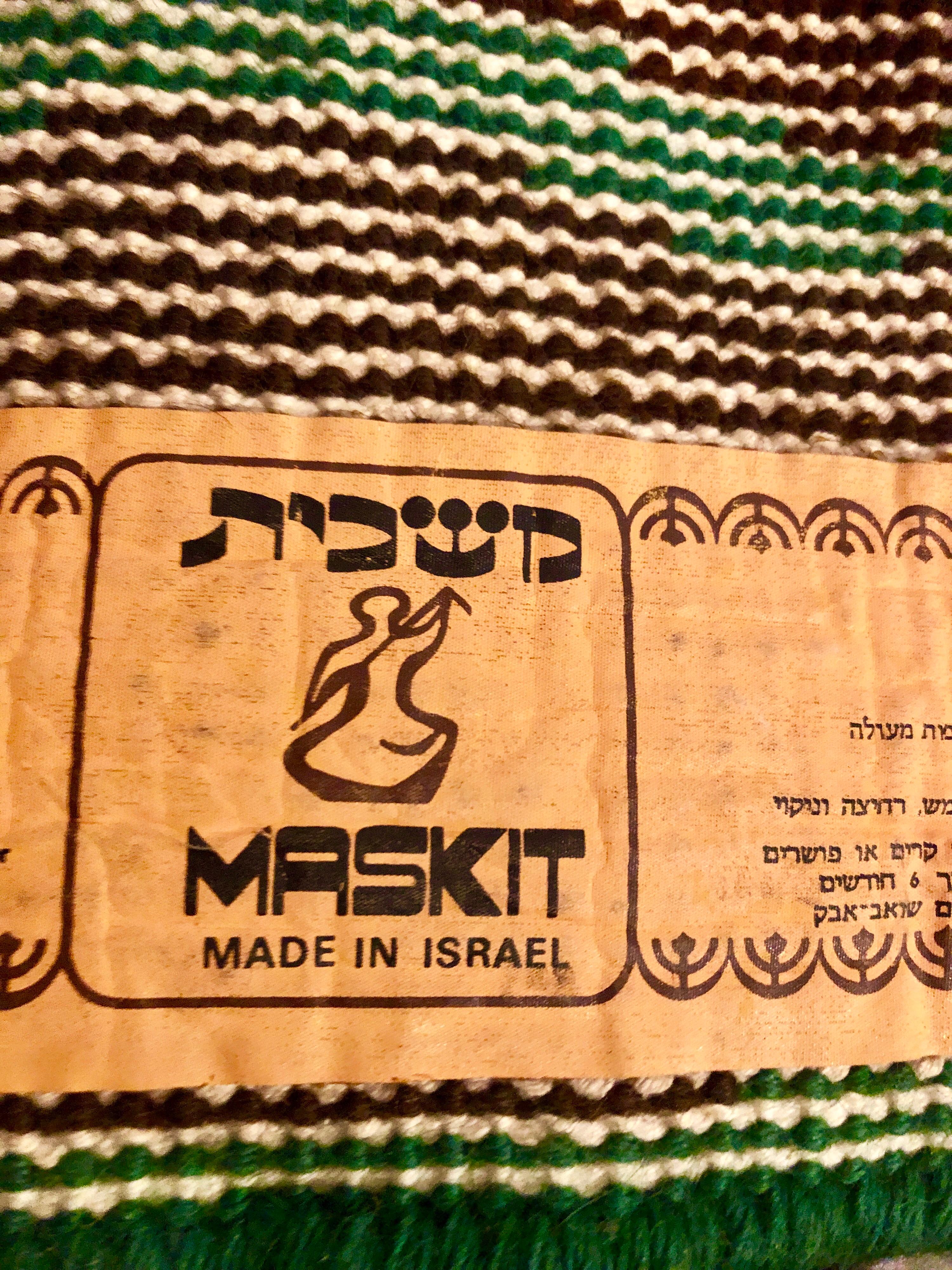 Original vintage tufted circa 1970's tapestry pile rug, hand knotted wool rug wall hanging.
Israeli landscape with palm tree and blazing desert sun.


Maskit (Hebrew: משכית‎) is an Israeli fashion house founded in 1954 by Ruth Dayan, wife of Moshe