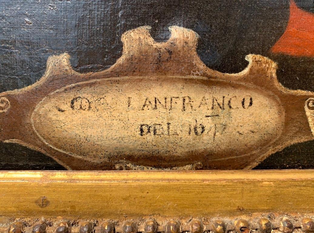 Italian master of the 17th century. - Portrait of Giovanni Lanfranco, knight of the Order of Christ. 

65.5 x 49 cm without frame, 83 x 68 cm with frame. 

Oil on canvas, in a carved and gilded wooden frame from the 19th century. 

- Inscription