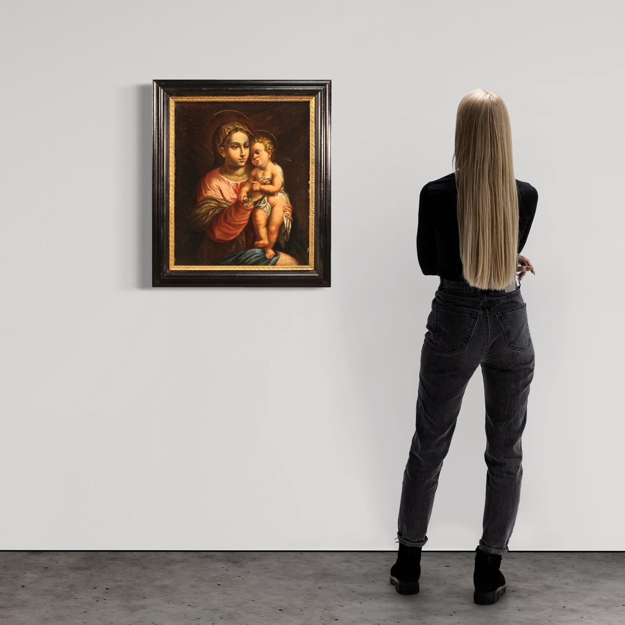 Antique Italian painting from the late 17th century. Framework oil on canvas depicting a religious subject Virgin with child of good pictorial quality. Framework of excellent proportion and quality finely represented in detail. Interesting is the