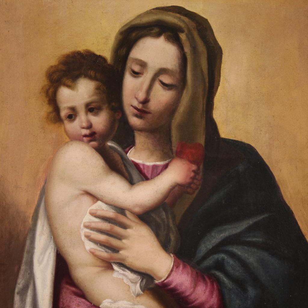 óleo sobre lienzo del siglo XVII Pintura religiosa italiana Virgen con el Niño, 1650 - Figurative Painting Brown de Unknown