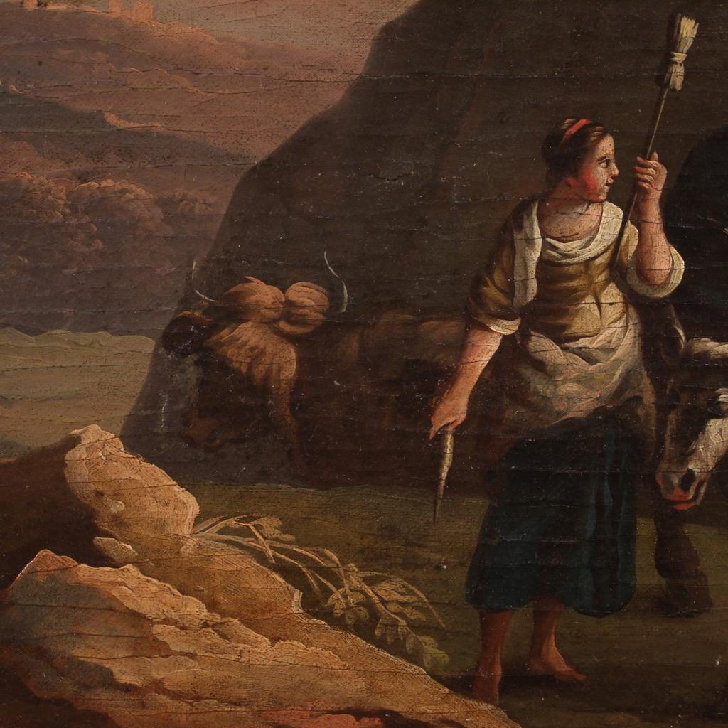 Espléndida pintura italiana de finales del siglo XVIII. Pintura al óleo sobre lienzo, primer lienzo, que representa un paisaje bucólico con figuras y animales de excelente calidad pictórica. En esta escena pastoral, en un ambiente tranquilo e