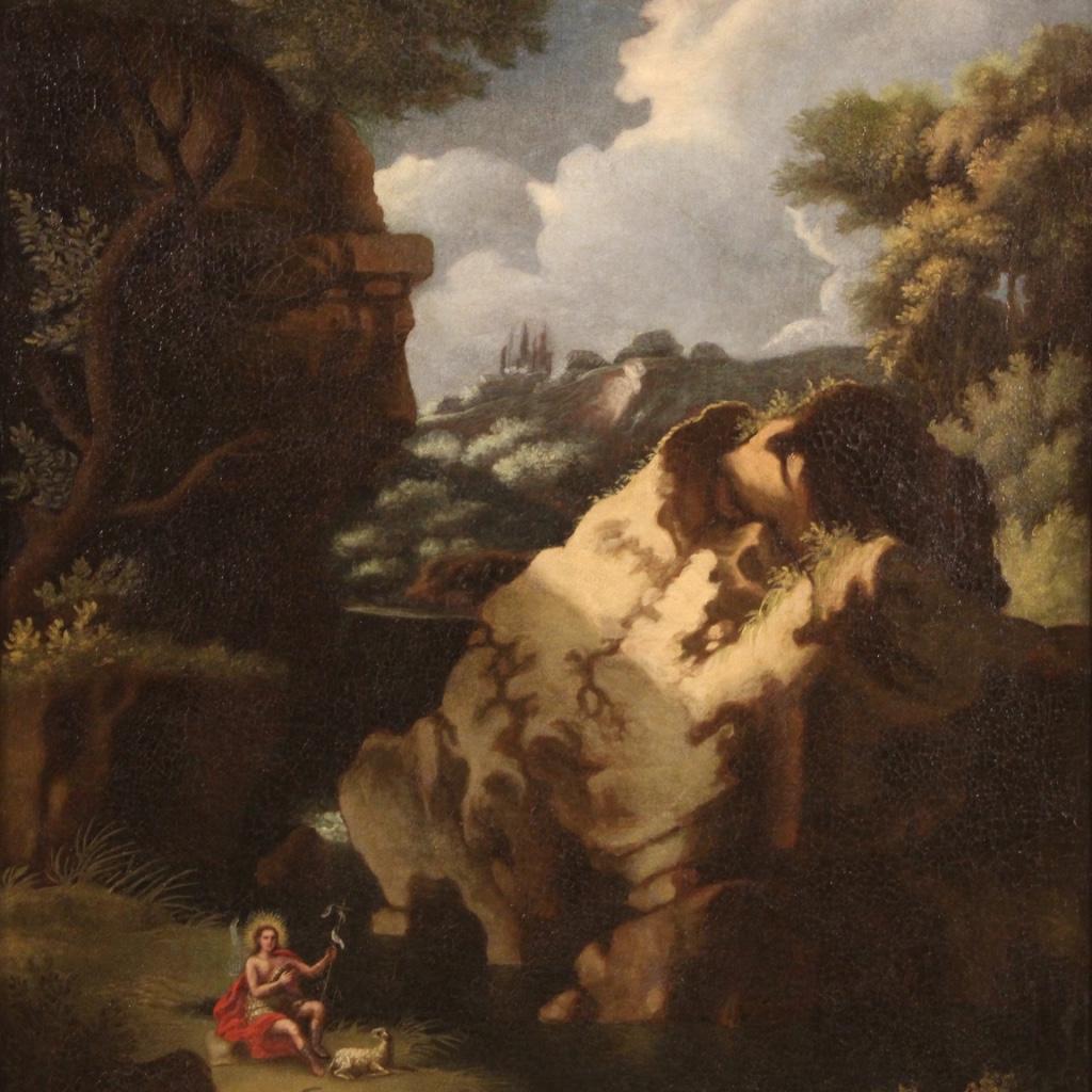 Antique Italian painting from the first half of the 18th century. Work oil on canvas depicting a wooded landscape with St. John the Baptist and a lamb of good pictorial quality. Beautifully sized and pleasantly decorated painting, of good