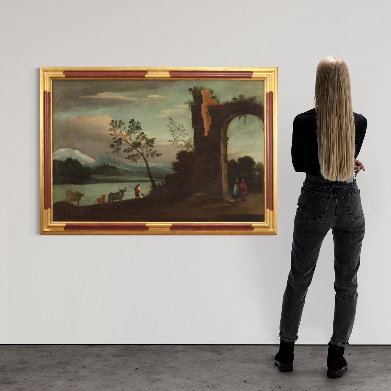 Antiguo cuadro italiano del siglo XVIII. Marco óleo sobre lienzo, en el primer lienzo, representando una vista con personajes, animales y ruinas de buena calidad pictórica. Marco de gran tamaño y agradable decoración con moderno marco de madera,