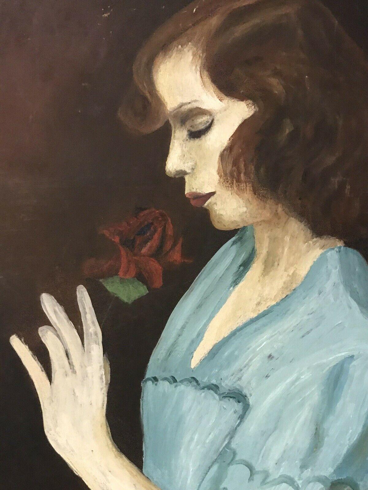 1950's FRENCH PORTRAIT OF YOUNG LADY SMELLING A RED ROSE - OIL ON PANEL - Painting by Unknown