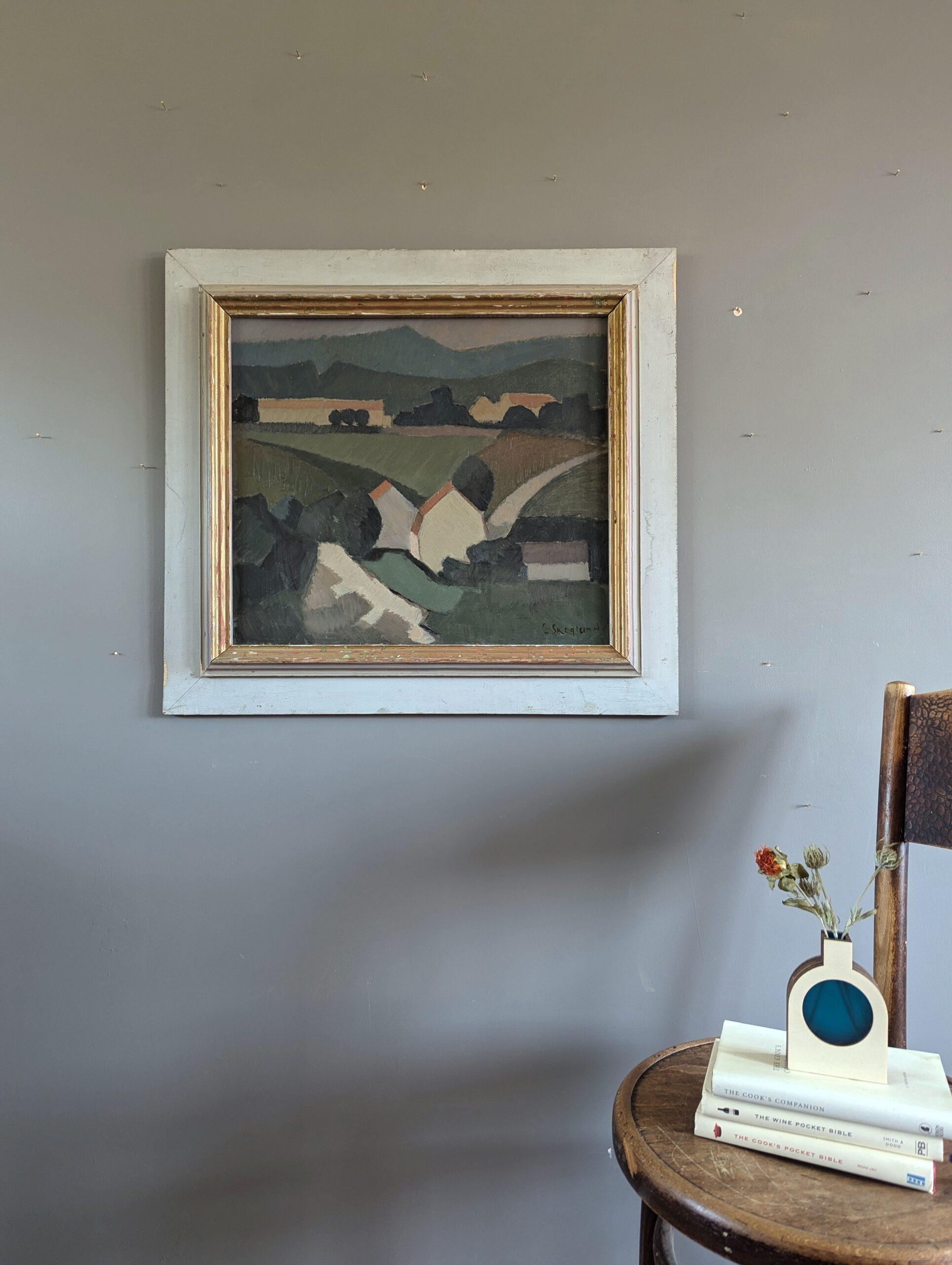 ROLLING GREENS
Size: 60 x 66 cm (including frame)
Oil on board

A mid-century modernist landscape painting that features a serene rural scene characterised by geometric simplicity and muted tones, executed in oil onto board and dated 1953.

The