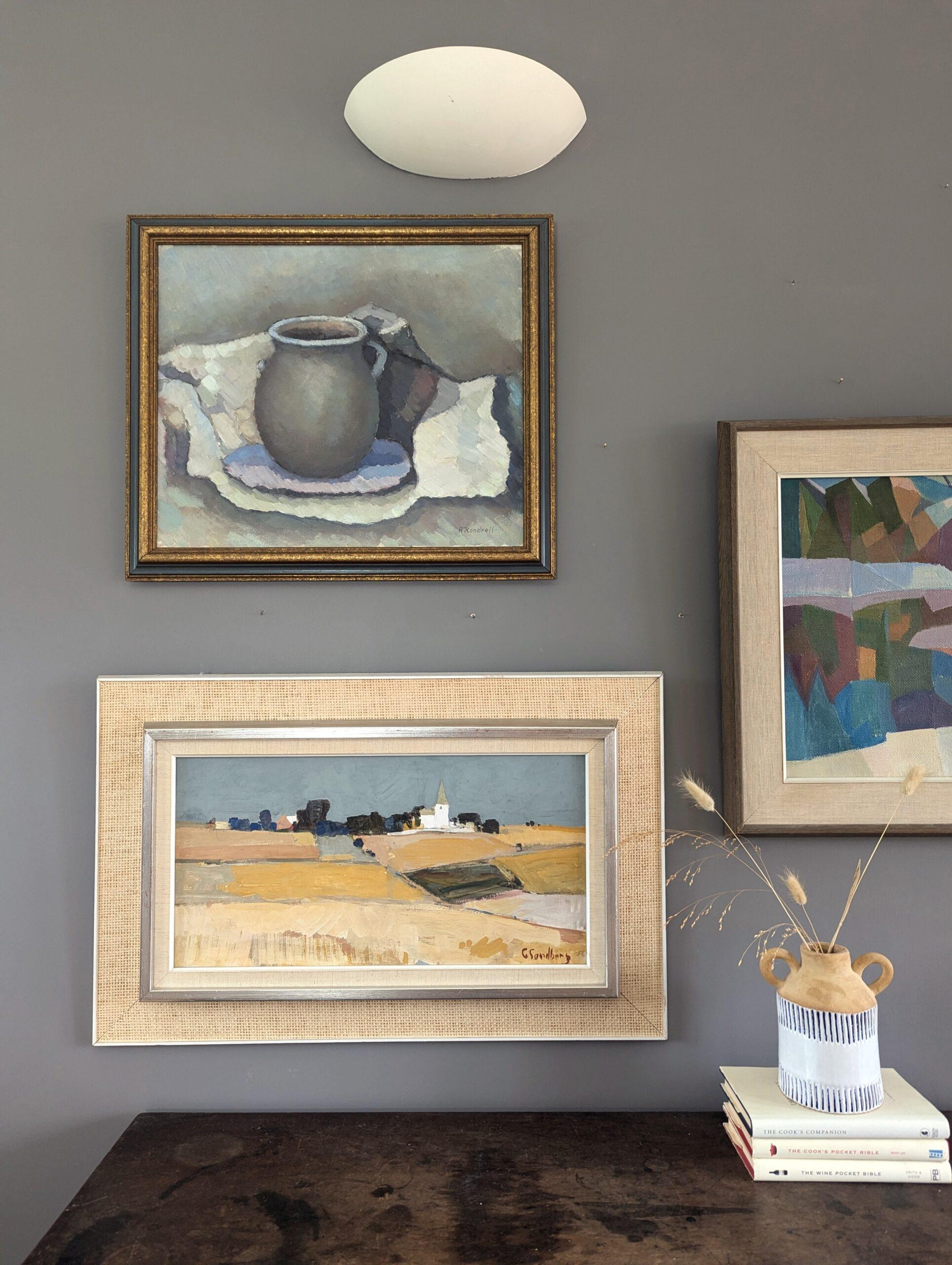 GOLDEN PLAINS
Size: 44 x 69 cm (including frame)
Oil on board

A soothing mid-century modernist style abstract landscape composition, executed in oil onto board and dated 1956.

The scene depicts a landscape setting with vast golden fields