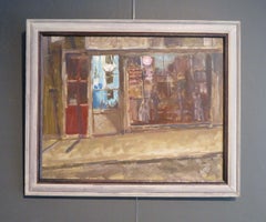 1970's English oil painting of a shop street scene at night - signed LARGE '77