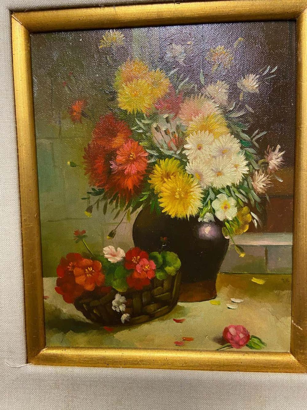 This is an oil on canvas painting depicting a still life with flowers. The piece was made in the 1980s. 

Framed: 21.5