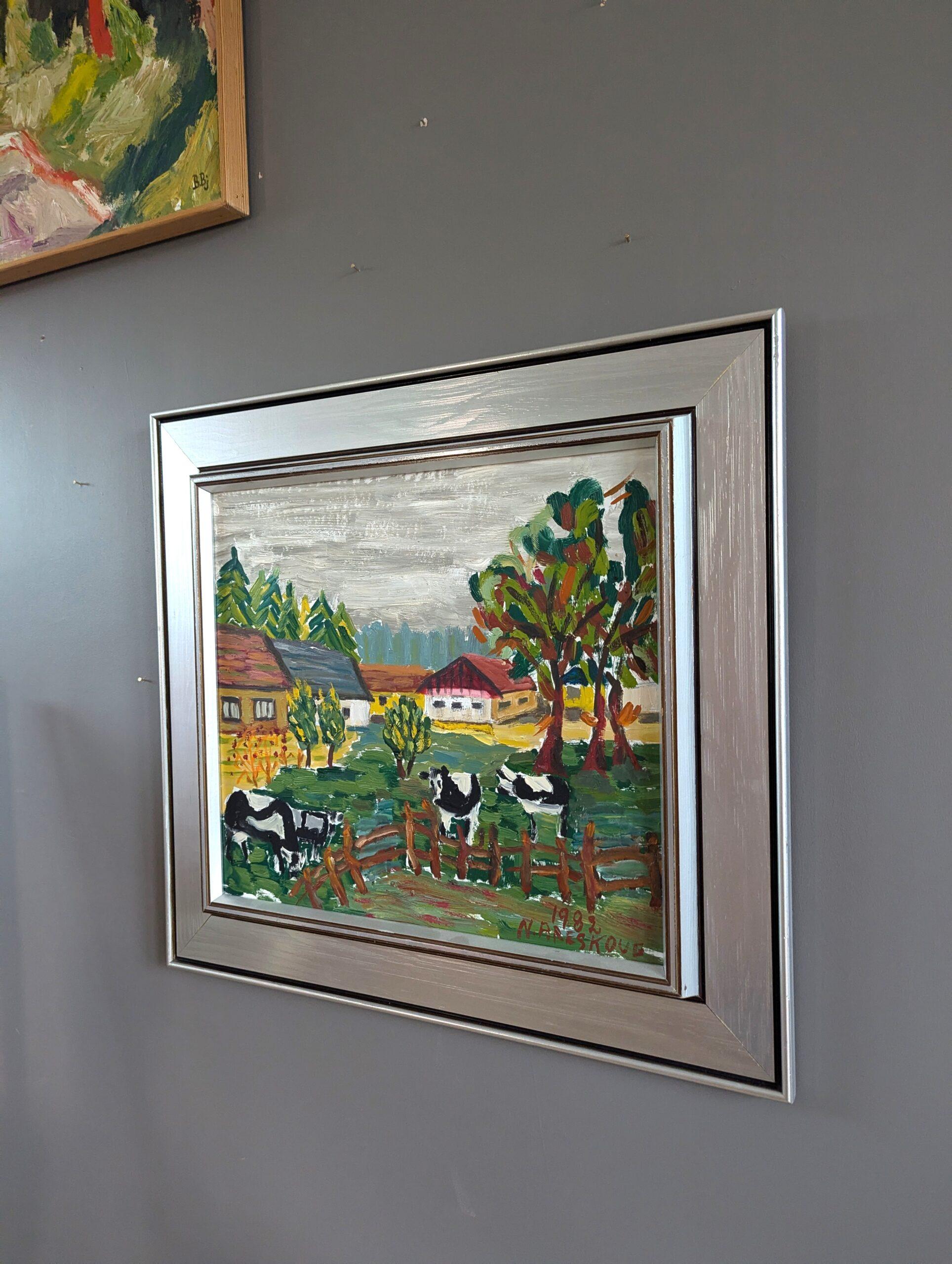 VACAS LECHERAS
Óleo sobre tabla
Tamaño: 49 x 53,5 cm (incluido el marco)

Un expresivo y encantador cuadro de paisaje, realizado en óleo sobre tabla y fechado en 1982.

La obra capta una apacible escena rural con vacas en blanco y negro pastando