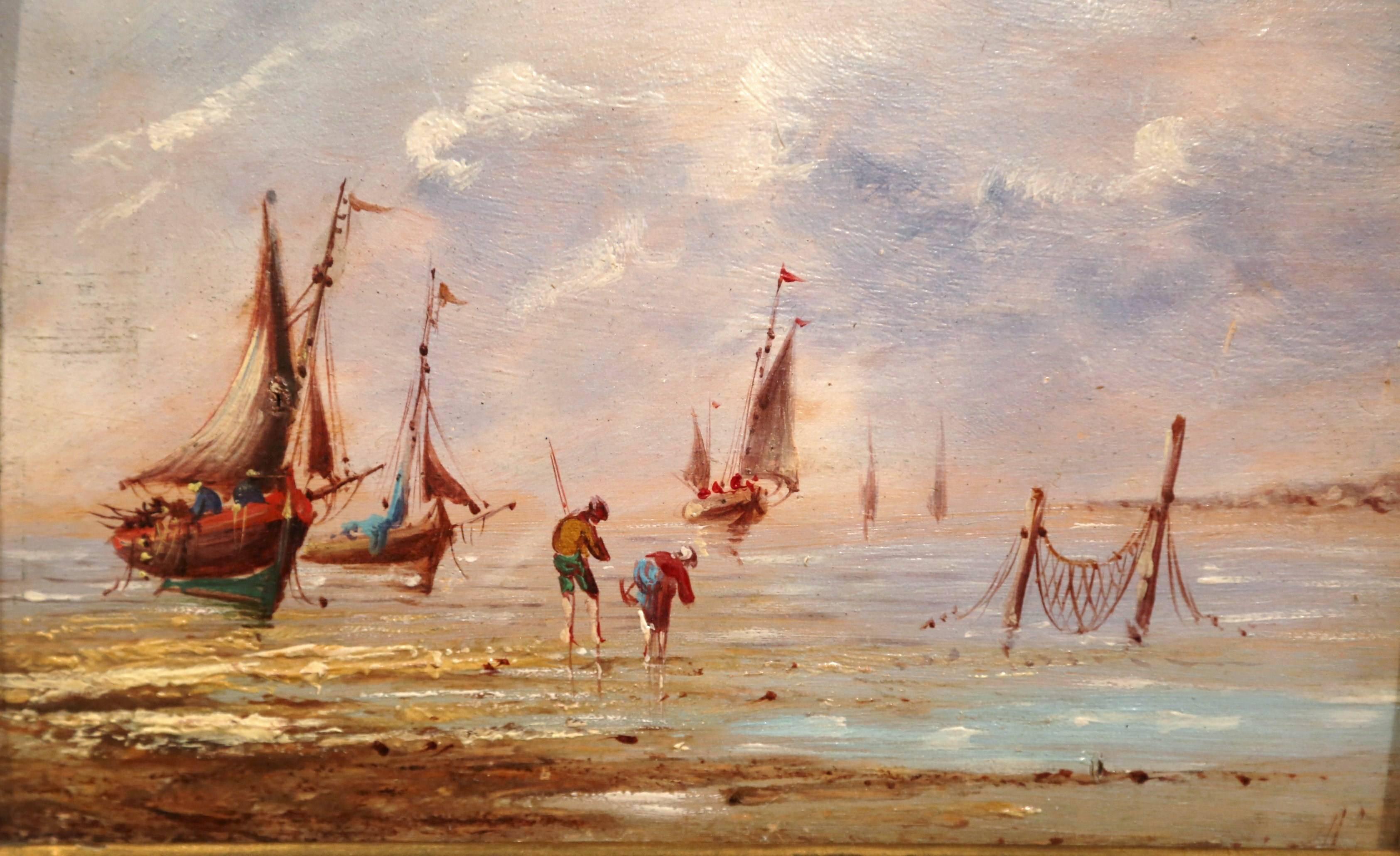 This small oil painting with original gilt frame was created in France, circa 1860; it features a typical fishing scene on the Brittany coast, with two people picking shellfish with sailboats in the background. Very detailed work and wonderful rich