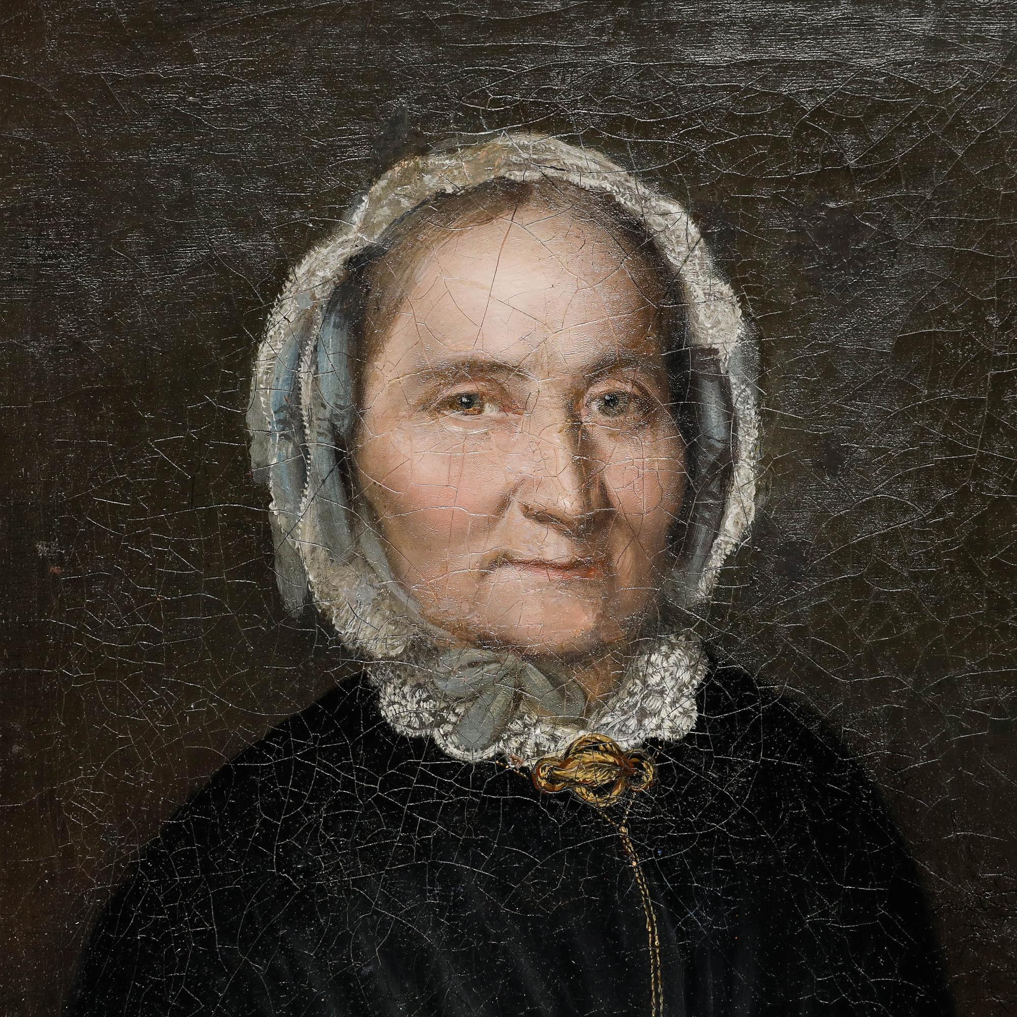 This formal portrait depicts an elderly woman dressed in traditional 19th-century attire, wearing a white lace bonnet and dark clothing against a somber black background. The composition follows classical portraiture conventions, with the subject