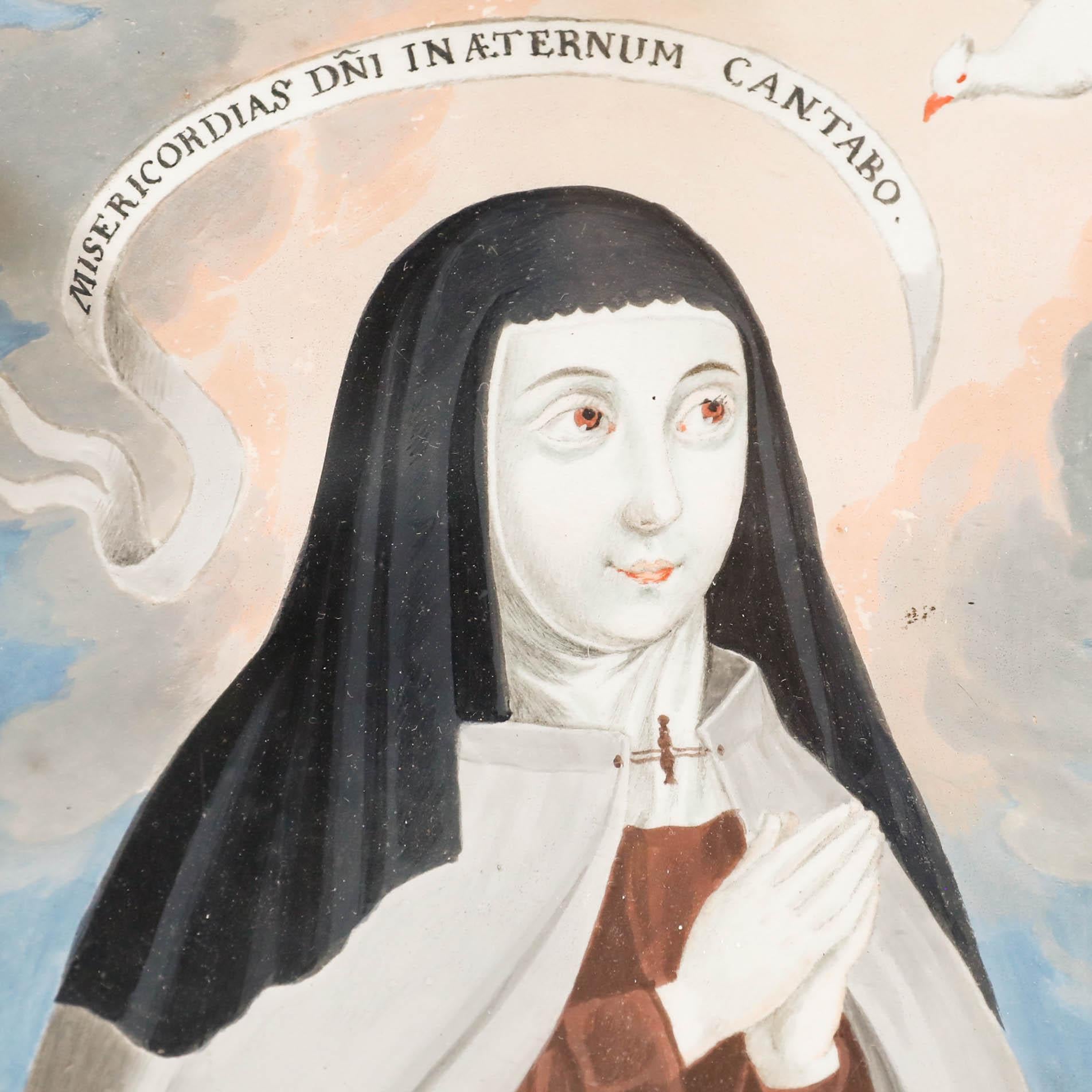 Eine bezaubernde Darstellung einer betenden Nonne, über deren Kopf eine Taube als Symbol des Heiligen Geistes fliegt. Über ihrem Kopf prangt ein lateinisches Spruchband mit der Aufschrift 