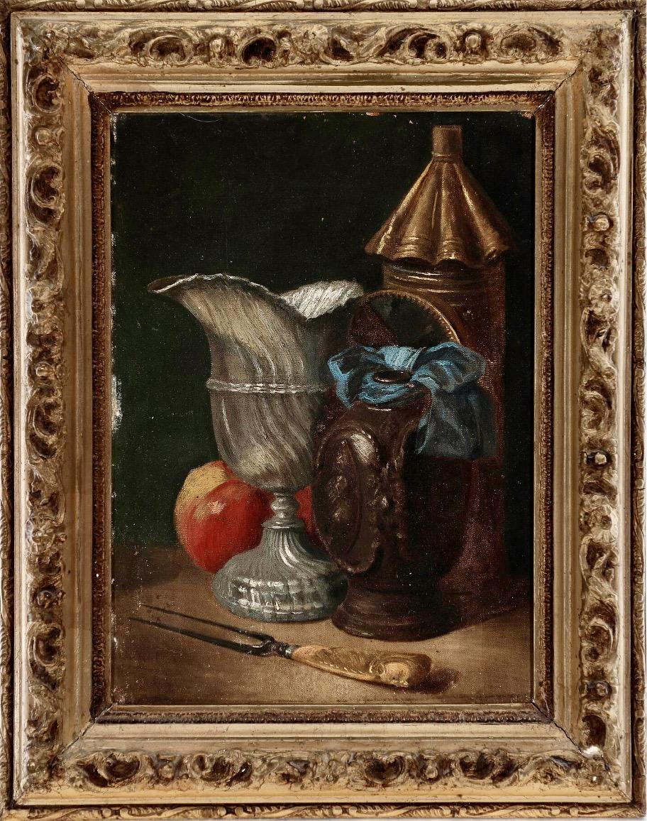 A charming 19th century still-life painted on canvas depicting an 18th century wine ewer, lantern, stoneware tankard with a blue ribbon bow, fork with a sculptured ivory handle, and an apple on a table against a dark background. Not signed. The