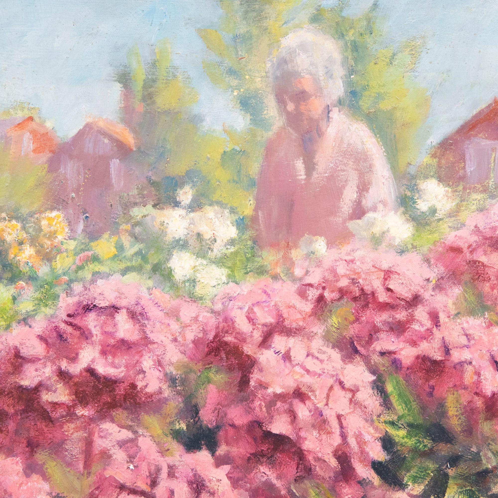 A charming oil study depicting a women strolling through a garden filled with flowers. The blooming hydrangeas in the foreground are captures in expressive brushstrokes of pink which is reflected in the woman's jacket. Unsigned. On board.
