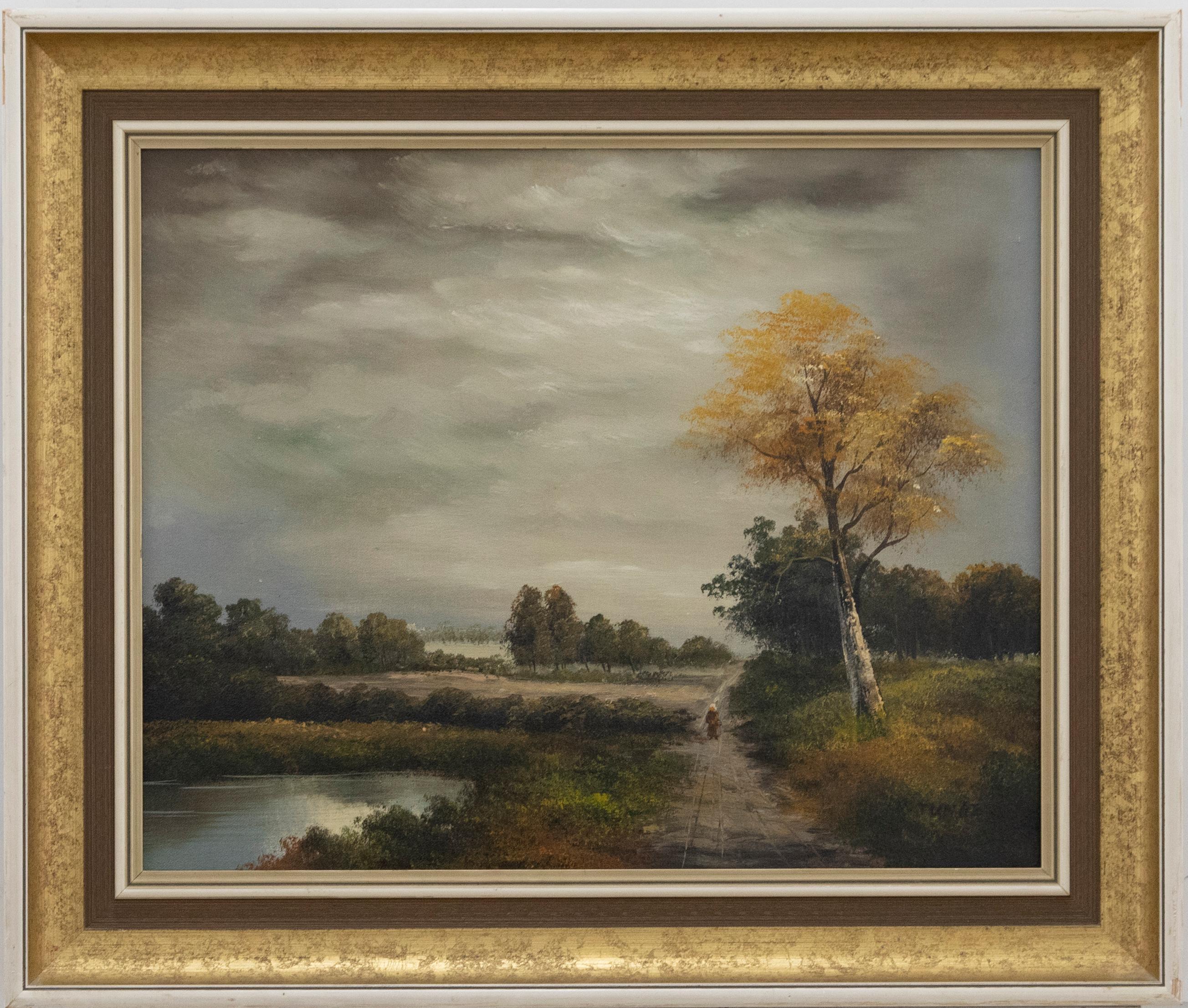 A charming country scene depicting a lone figure strolling down a sunlit path by a lake. Unsigned. Presented in a wooden frame with a gilt-effect cove. On canvas.