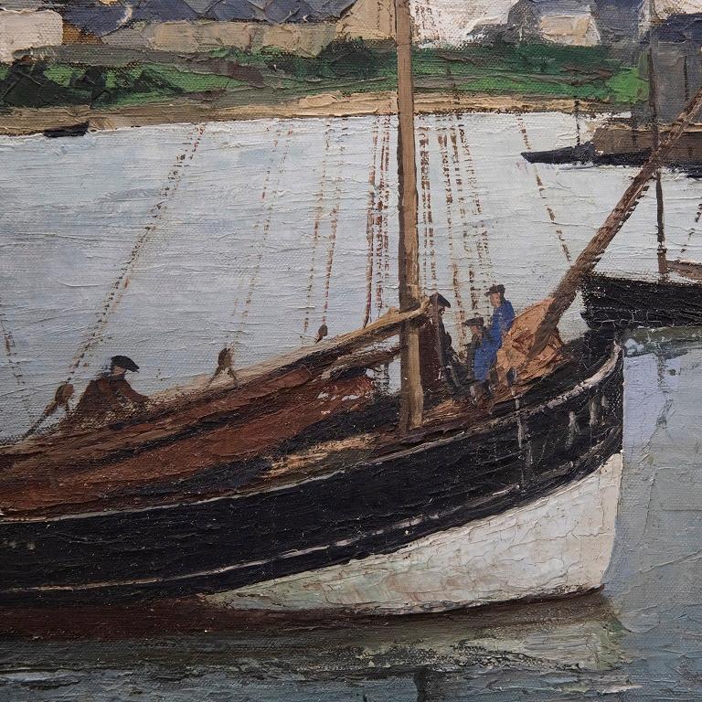 A charming oil study of a French harbour on a overcast morning. In the foreground a crew of men prepare a sailboat for the day. The artist uses a muted palette and a light impasto technique to capture the tranquil scene. Signed to the lower right.